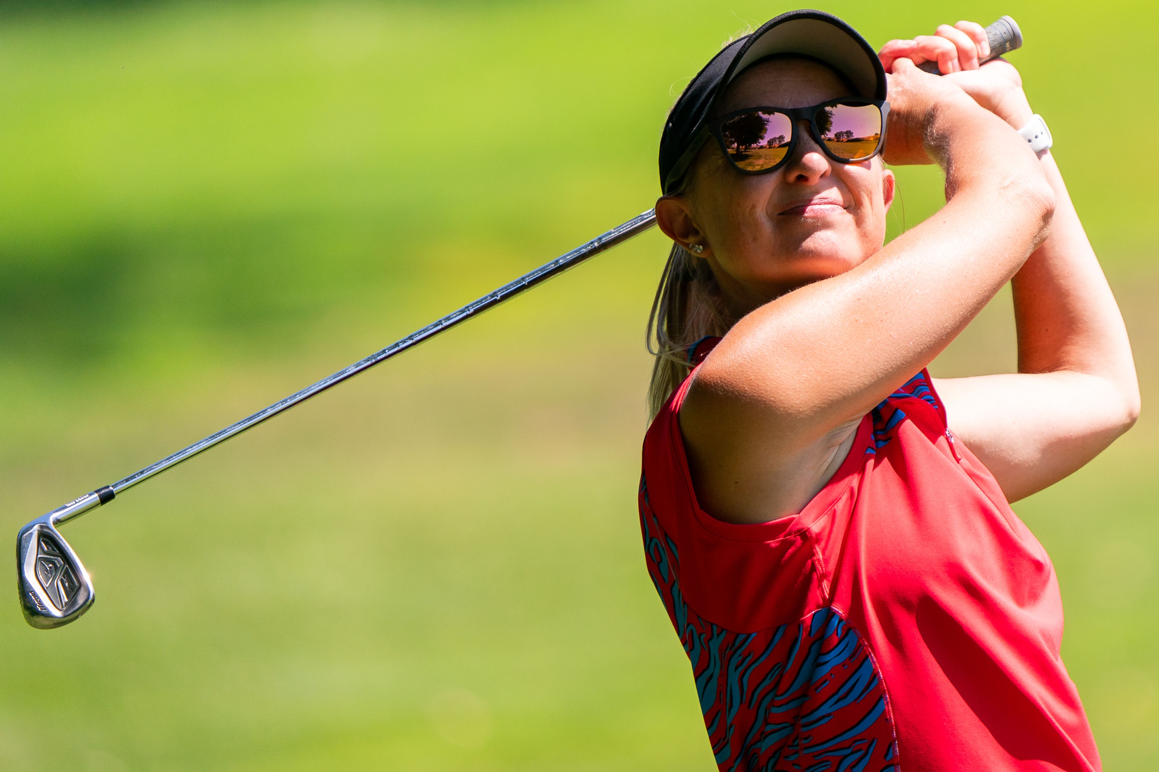 Jessica Shawley watches her ball after hitting it closer to the hole during the Tribune Cup women’s golf tournament on Tuesday at Red Wolf Golf Club in Clarkston. Shawley represented Quail Ridge Golf Course during the tournament.