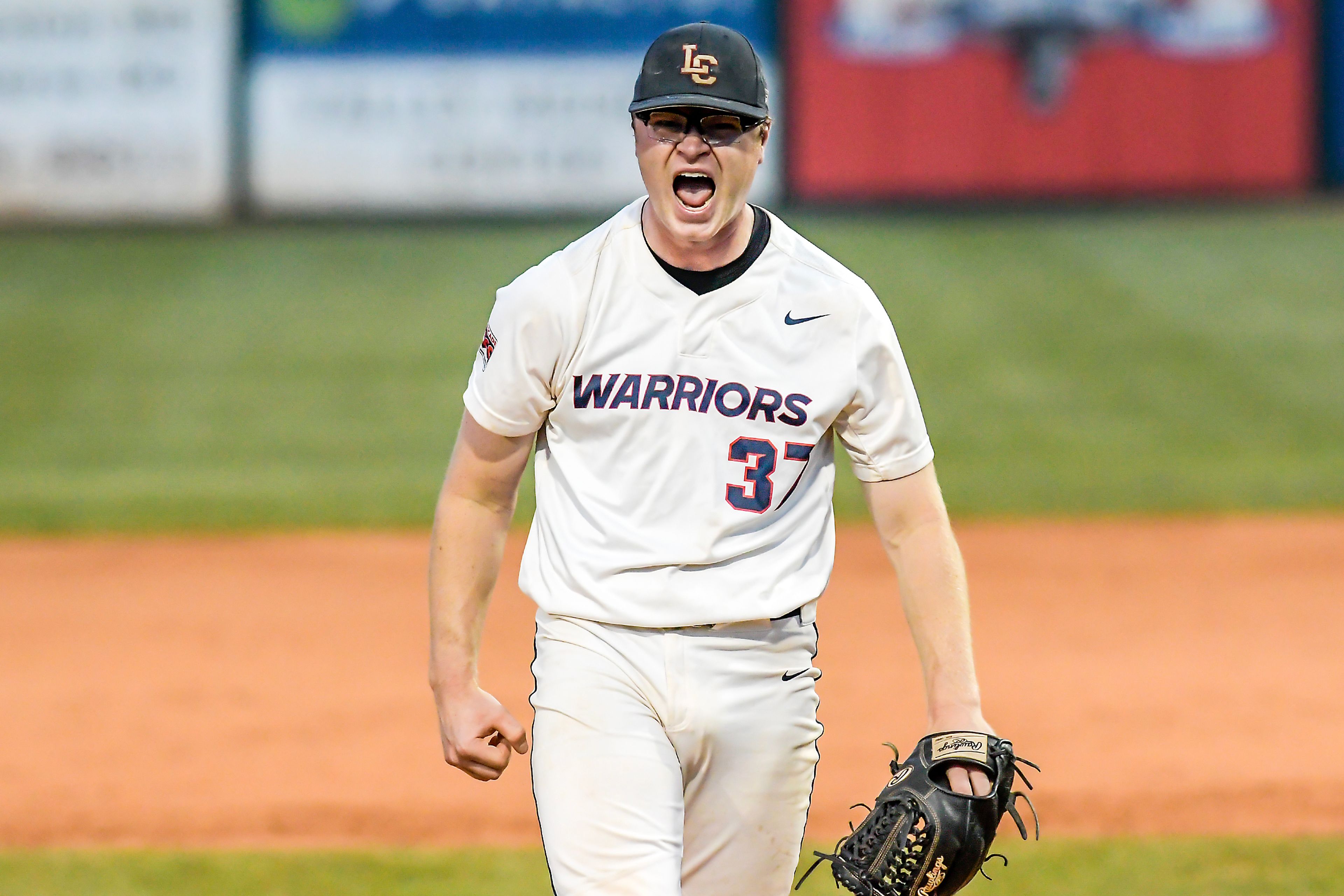 Lewis-Clark State pitcher Cameron Smith reacts after ending an inning against UBC in a first round game of the NAIA Opening Round Monday at Harris Field in Lewiston.