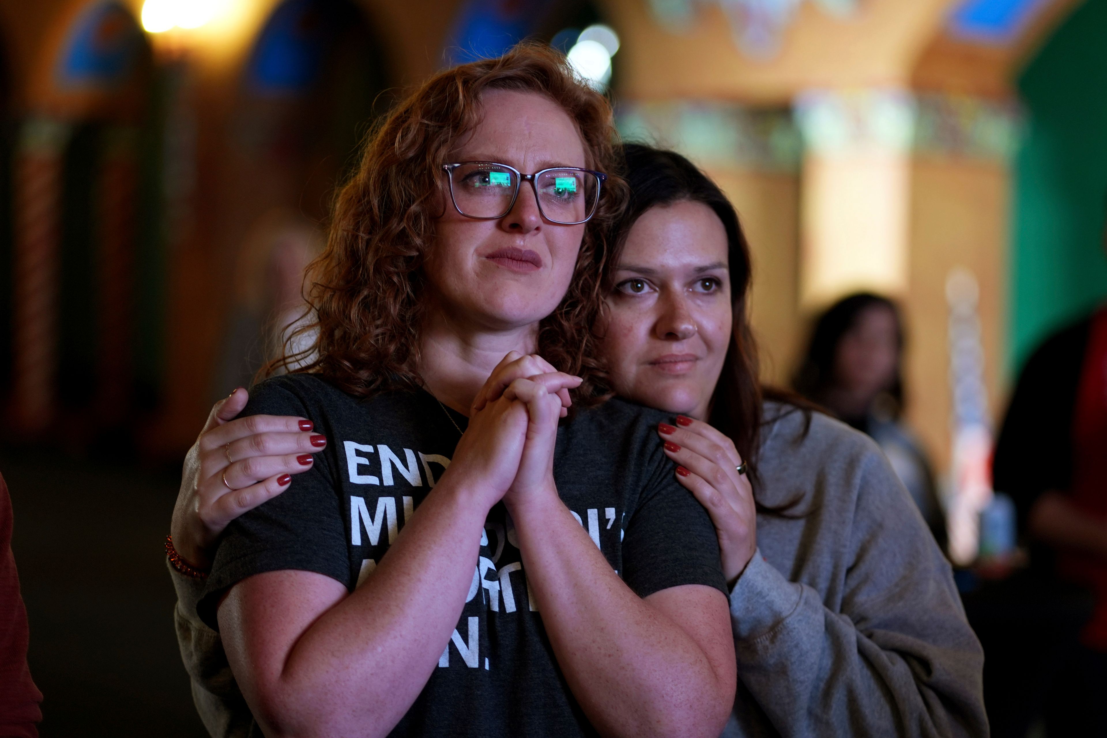 People giving there first names Erika, left, and Leeann react after an abortion rights amendment to the Missouri constitution passed, Tuesday, Nov. 5, 2024, at a watch party in Kansas City, Mo. (AP Photo/Charlie Riedel)