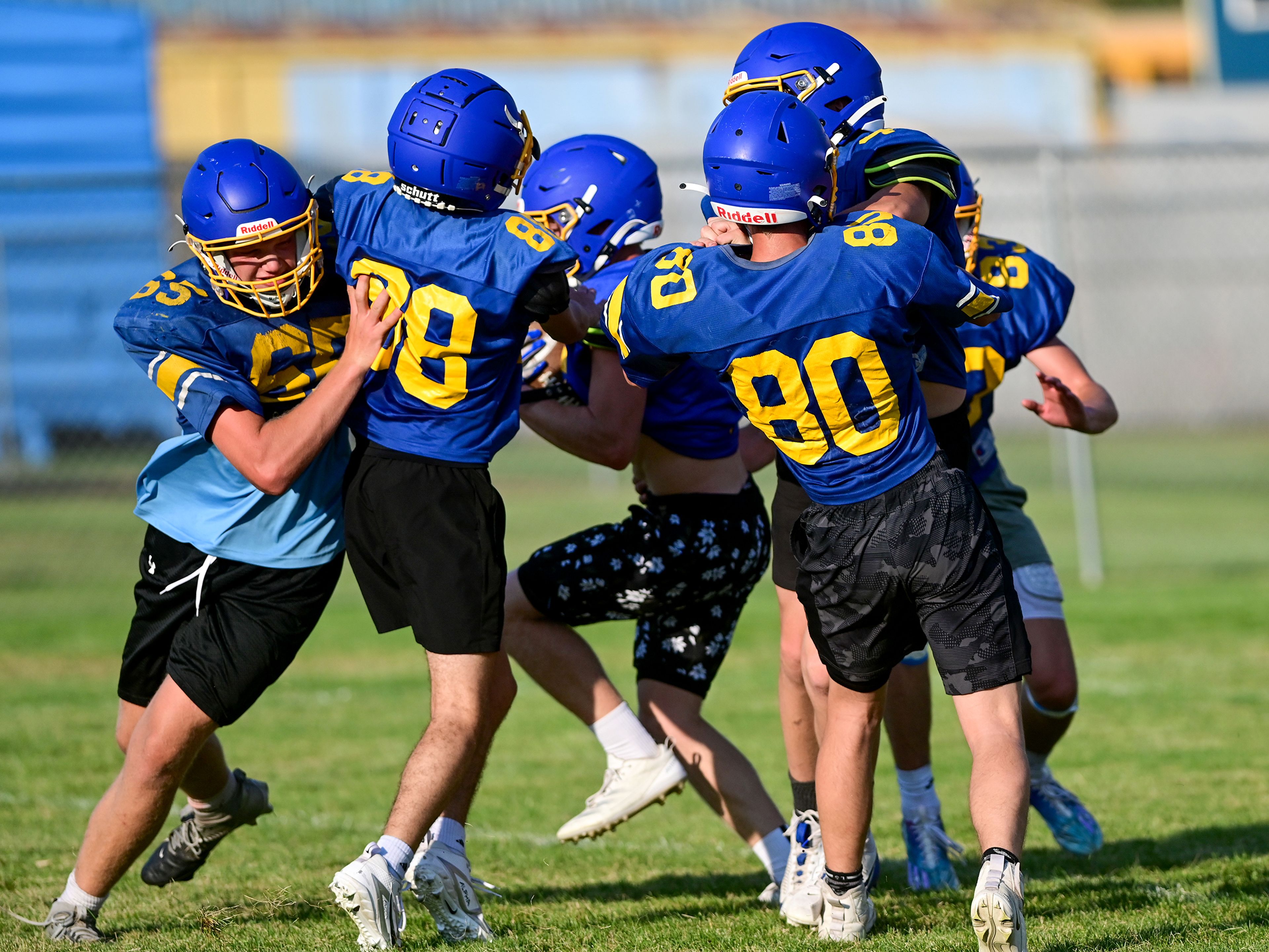 Colfax runs through plays at practice on Tuesday.