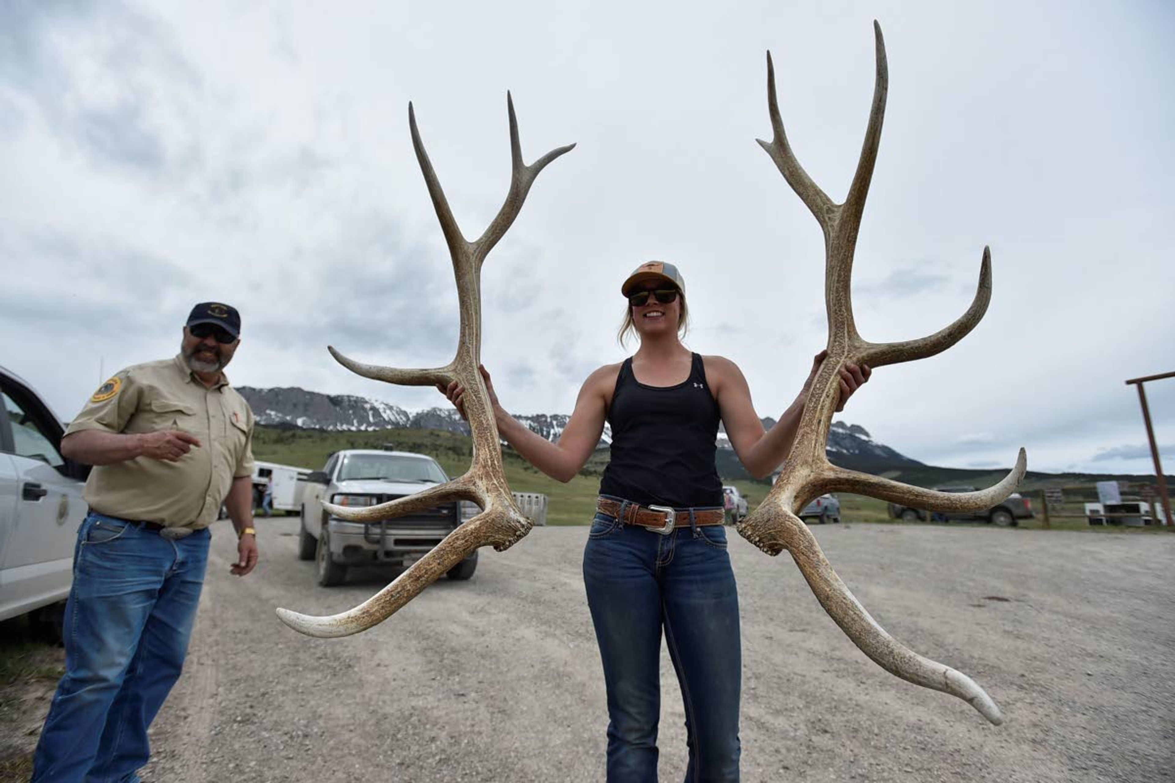 Savanah Swanson holds a set of shed elk antlers May 15 at the Sun River Wildlife Management Area in Montana.