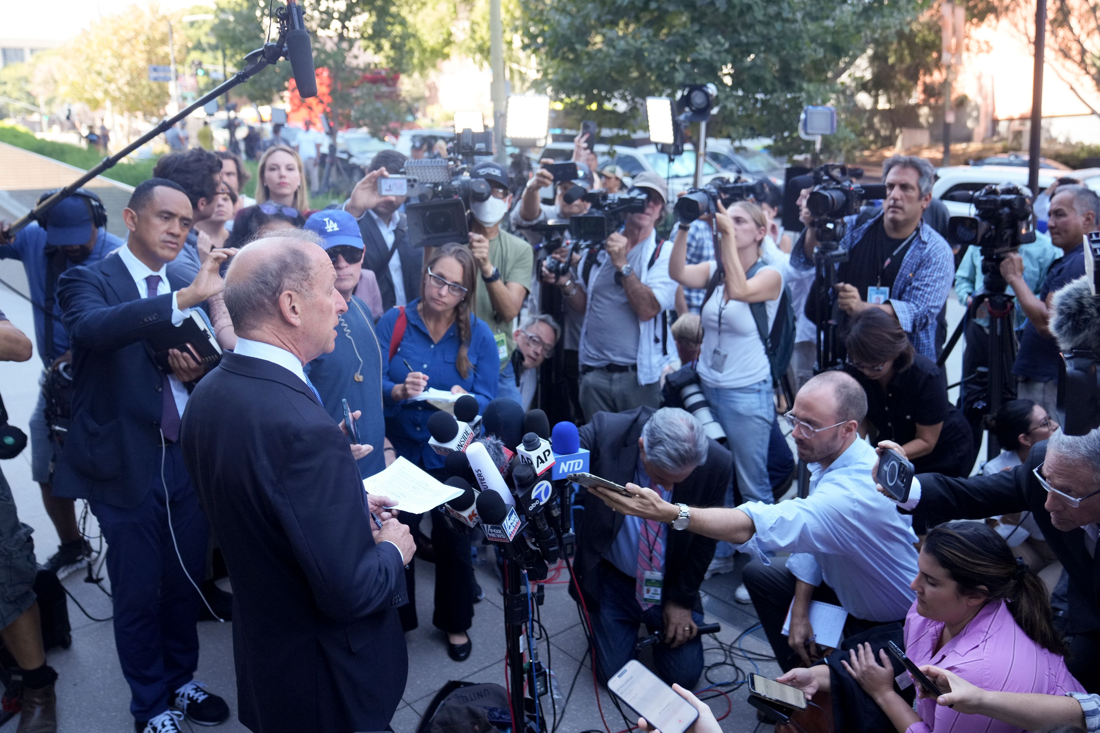 Abbe Lowell, left, an attorney for Hunter Biden, makes a statement after Biden pled guilty to federal tax charges, Thursday, Sept. 5, 2024, in Los Angeles. (AP Photo/Eric Thayer)