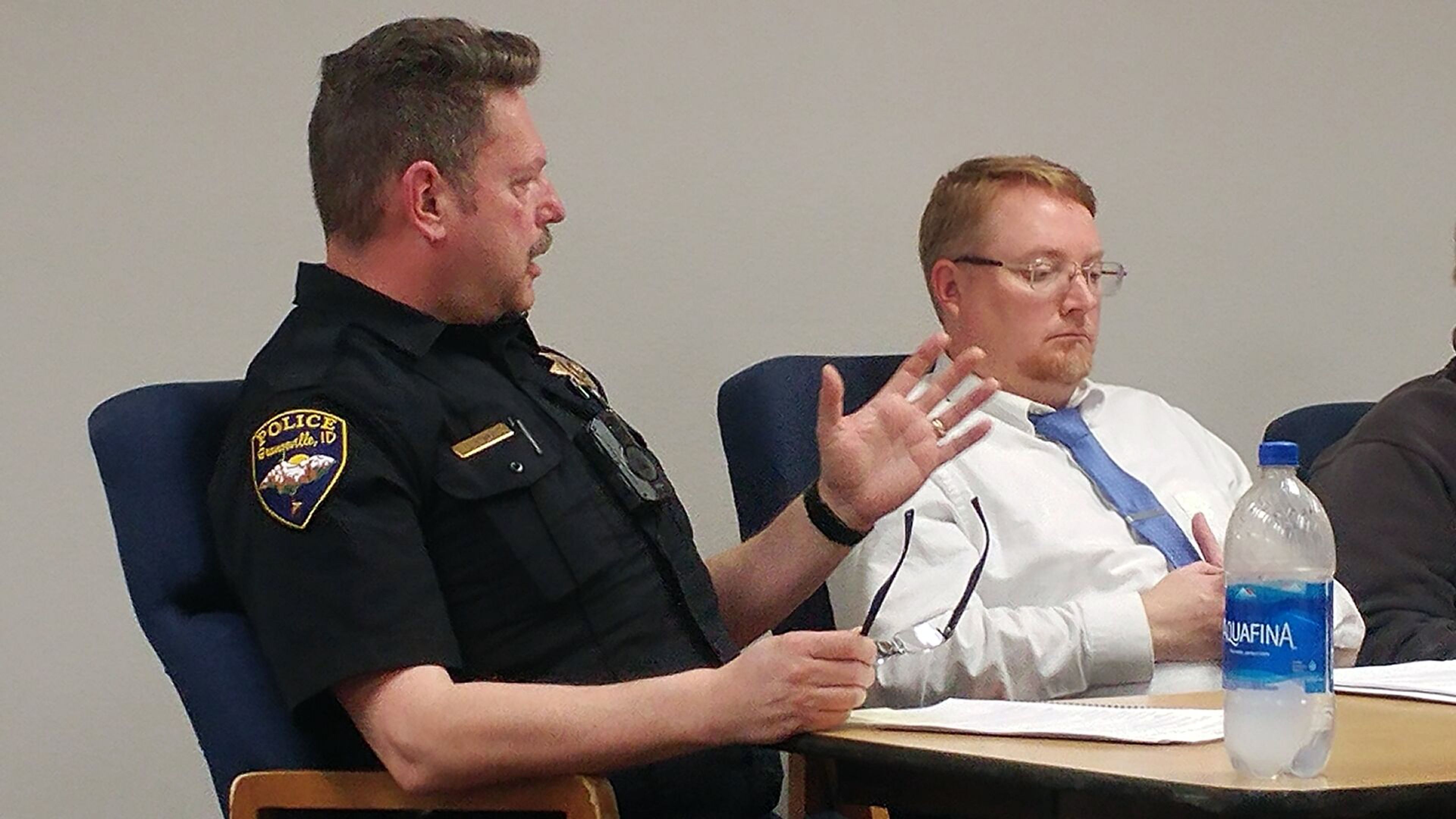 Grangeville Police Chief Joe Newman, left, discusses the issue of people living in cars on city streets. To his left is city attorney Adam Green.