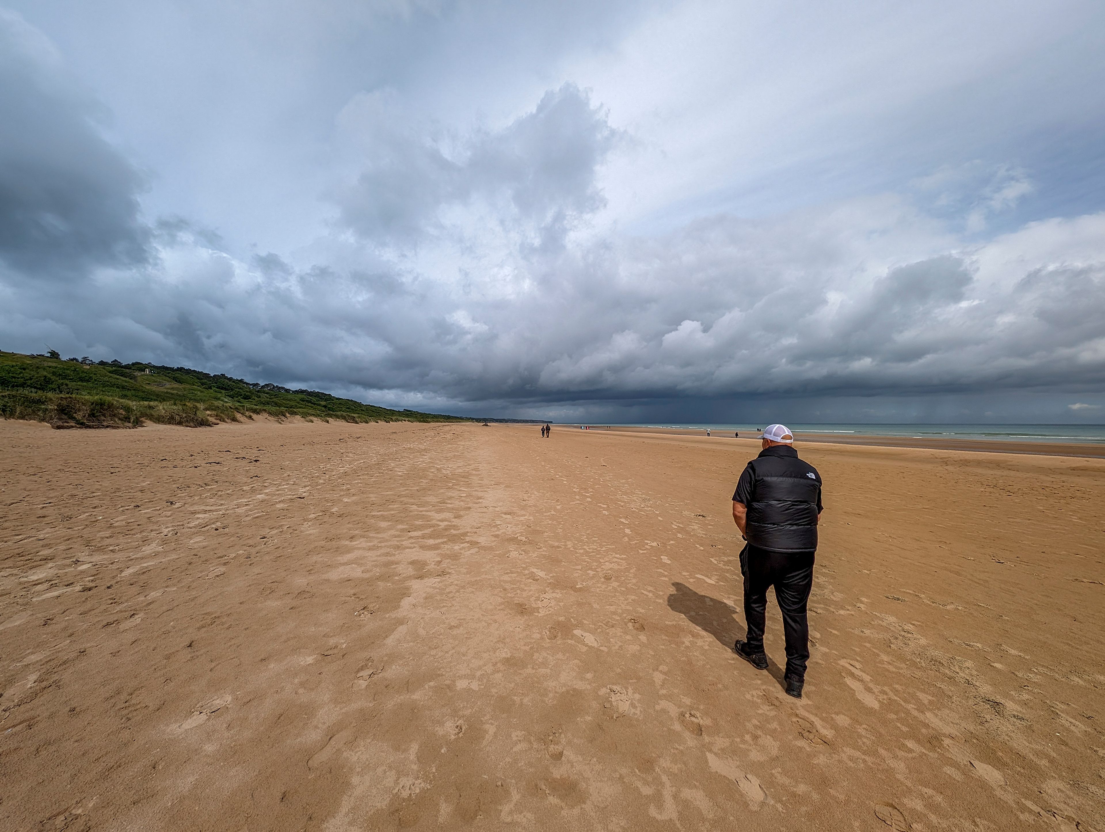 Mike Kramer walks Omaha Beach in Normandy France.