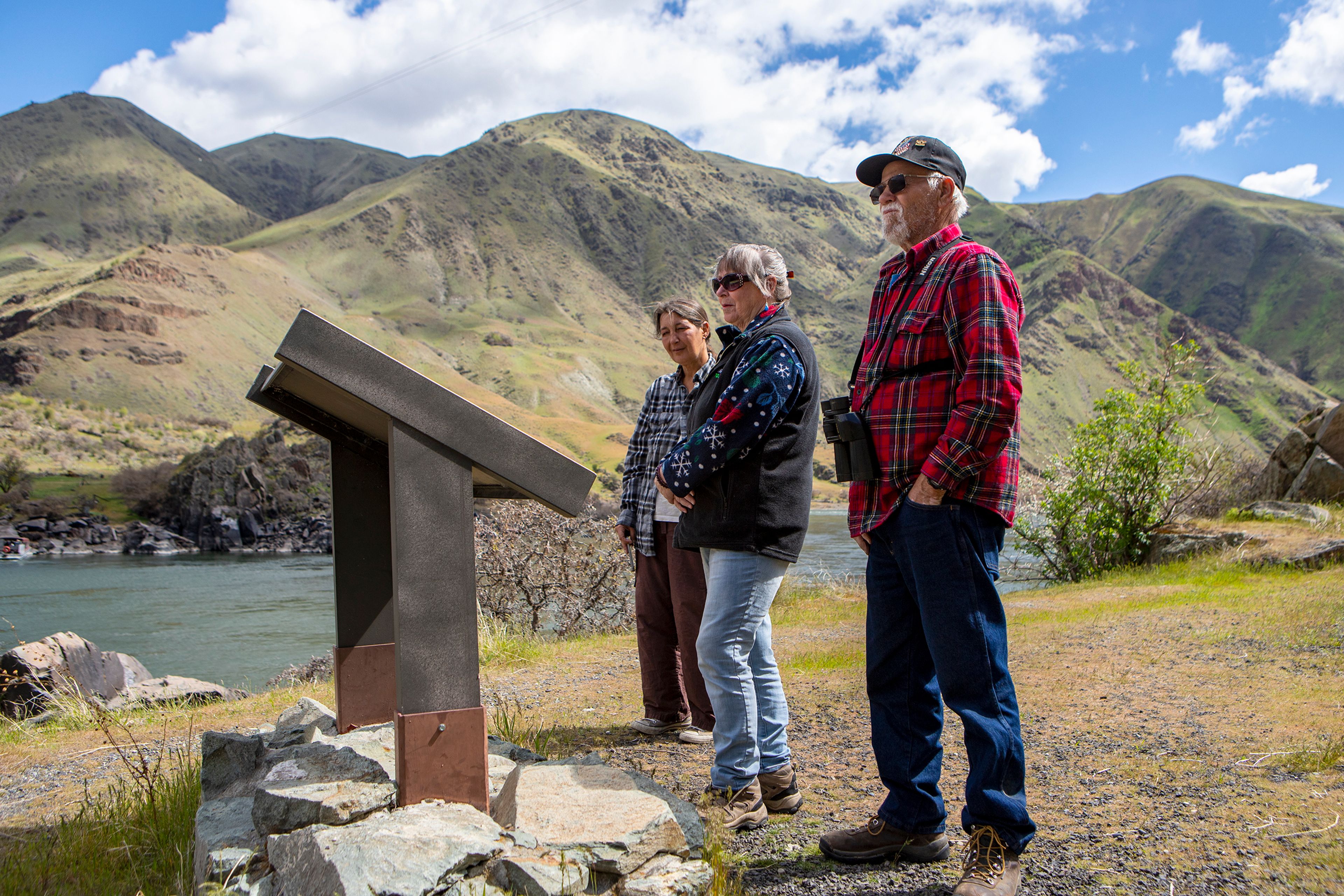 Jerry and Cindy Reisinger, right, of Pomeroy, along with Anna Medici, a friend visiting from Maine, read an informational plaque at the Buffalo Eddy.