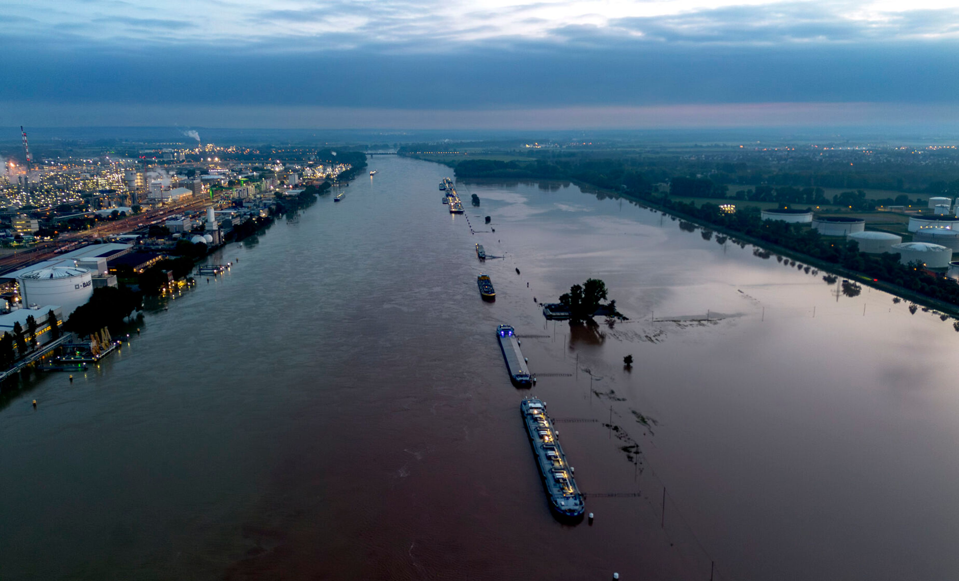 Body of a 5th victim is recovered from a submerged car after flooding in Germany