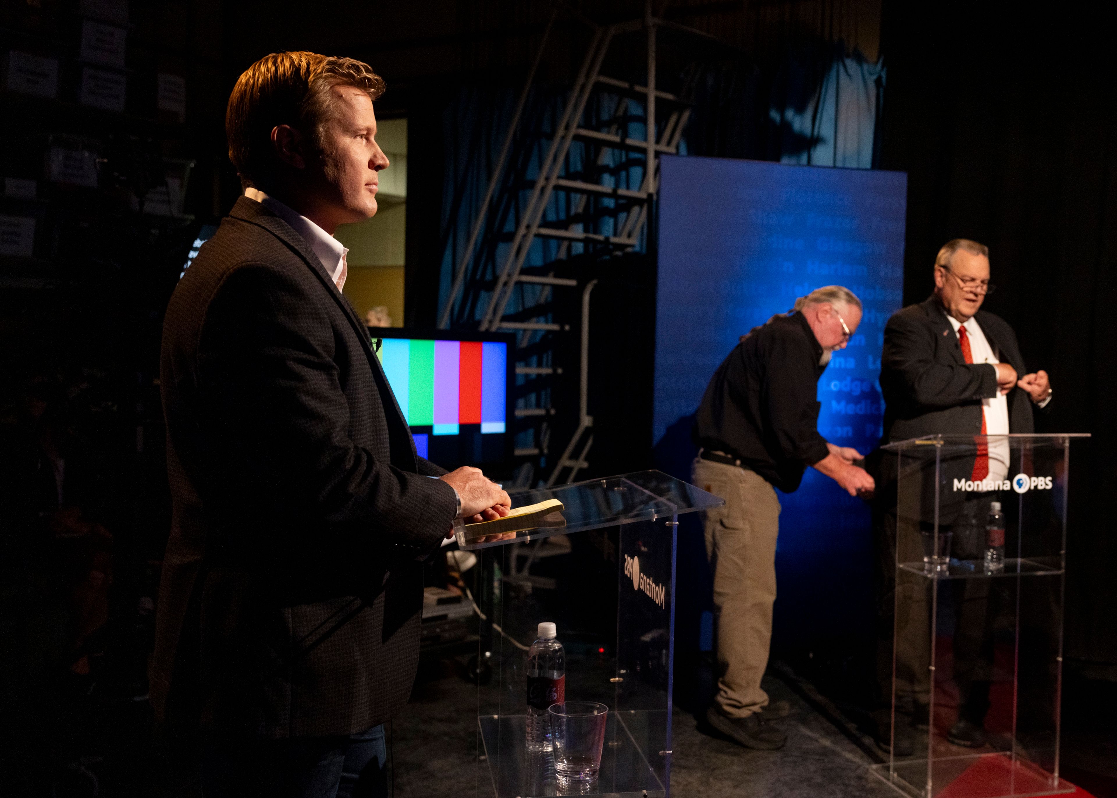 Tim Sheehy, left, prepares to debate U.S. Sen. Jon Tester, right, on campus at the University of Montana in Missoula, Mont., Monday, Sept. 30, 2024. (Ben Allan Smith/The Missoulian via AP)