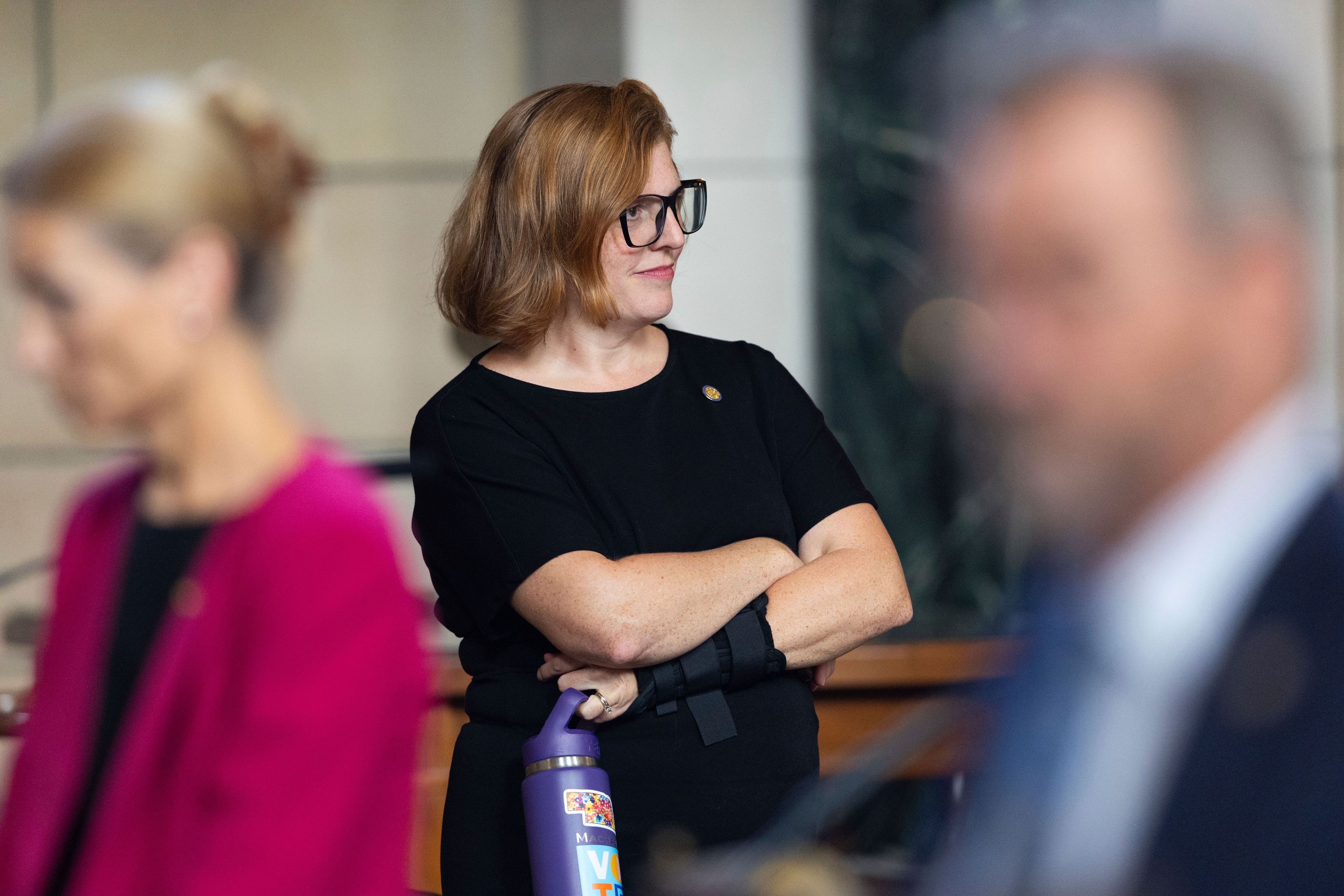 State Sen. Machaela Cavanaugh works on the legislative floor of the Nebraska State Capitol during the 108th Legislature 1st Special Session, Aug. 8, 2024, in Lincoln, Neb.