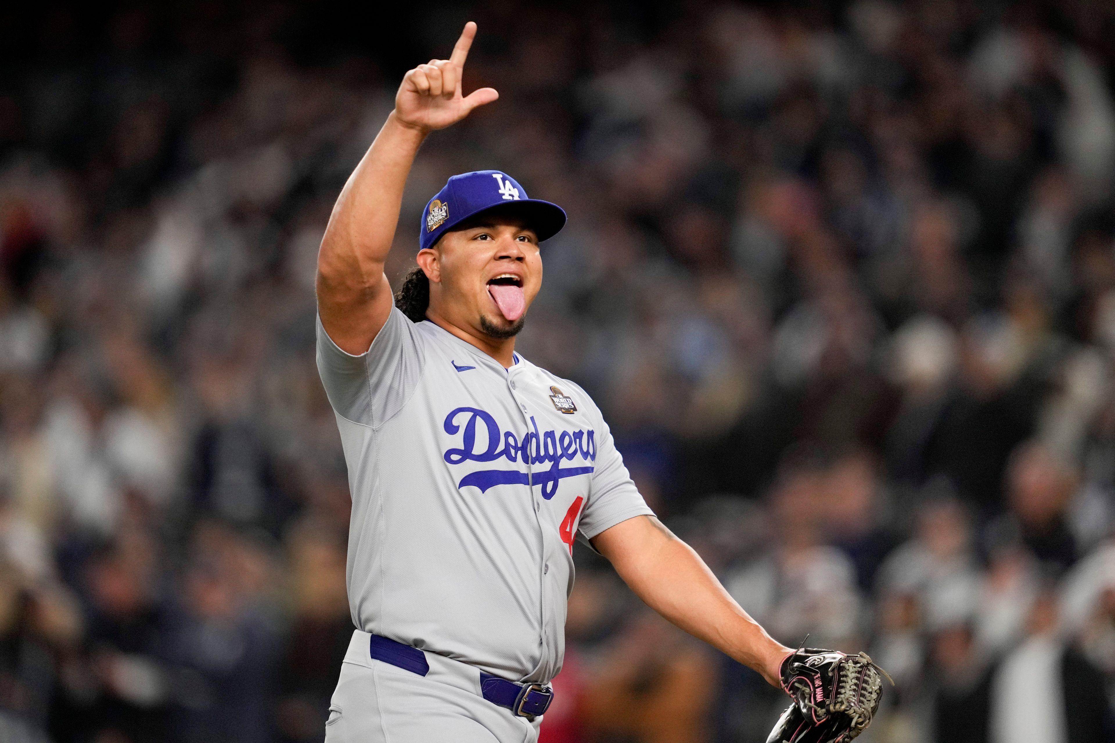 Los Angeles Dodgers pitcher Brusdar Graterol celebrates against the New York Yankees during the sixth inning in Game 3 of the baseball World Series, Monday, Oct. 28, 2024, in New York. (AP Photo/Ashley Landis)