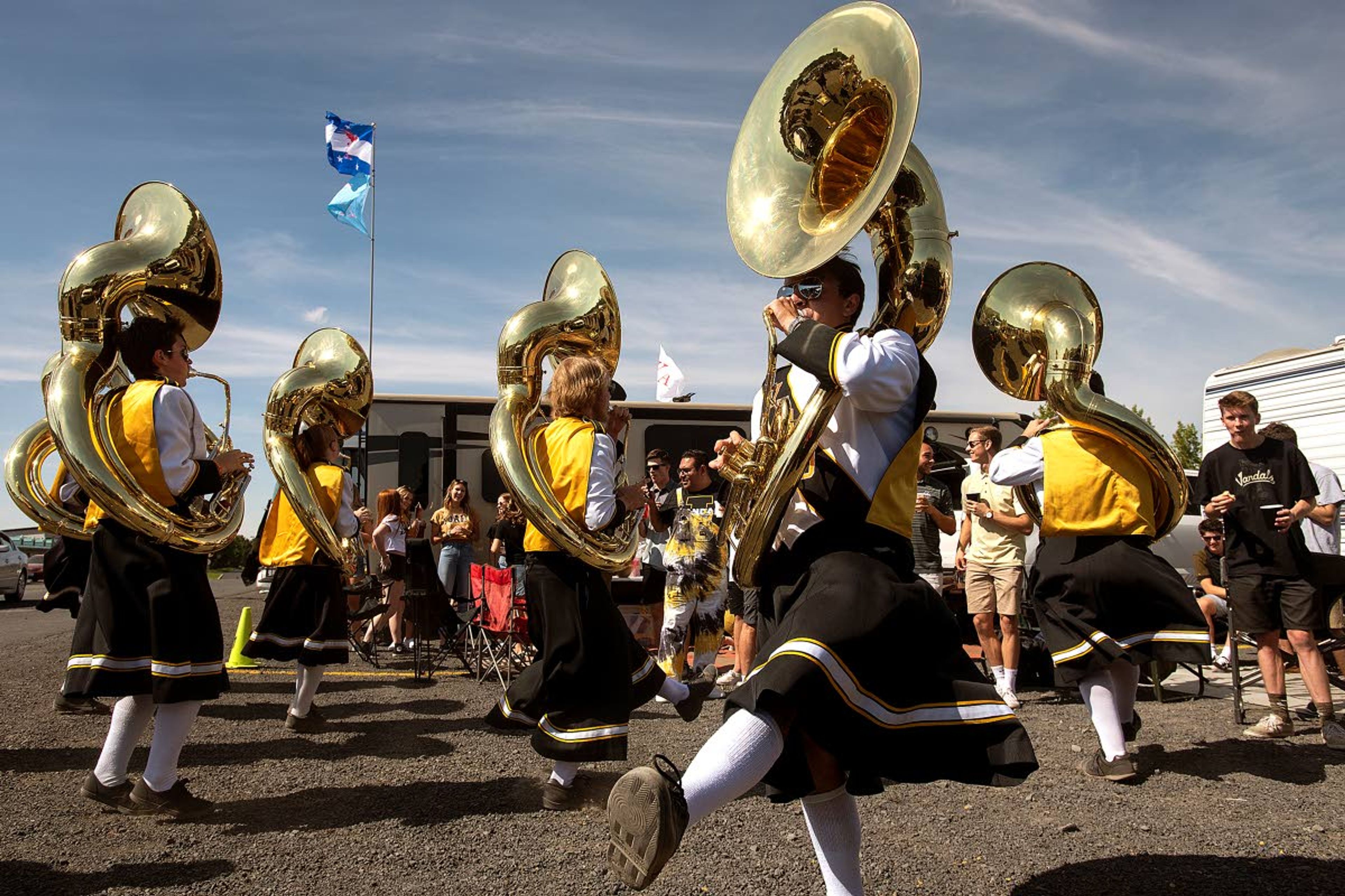 Tim Malm (center foreground) kicks up a storm with his fellow sousaphone players as they perform “In Heaven There Is No Beer” — a fan favorite — at a tailgate party Sept. 8. The party was prior to kickoff of Idaho’s home-opener football game against Western New Mexico.