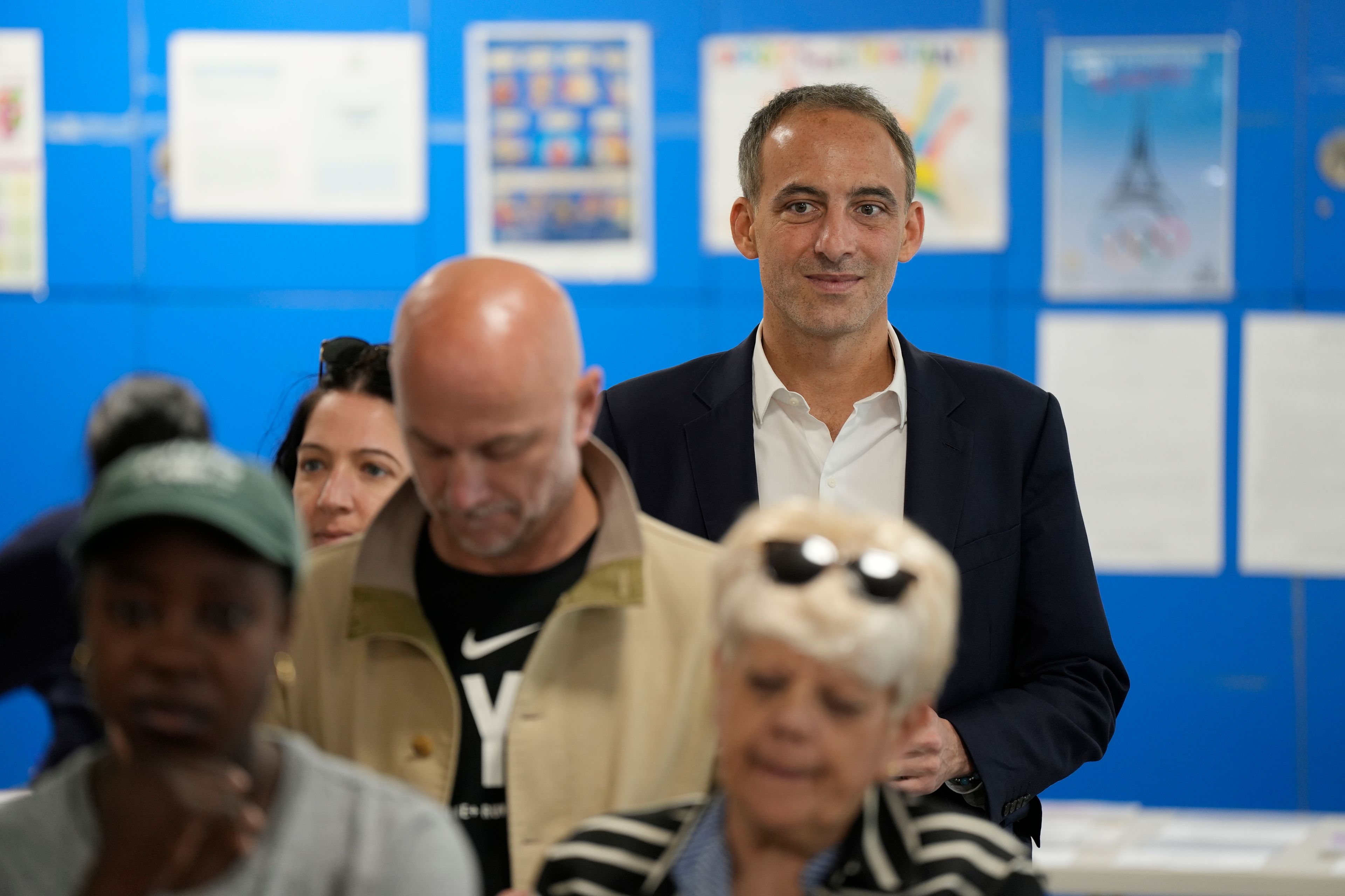 French Socialist Party lead candidate for the European election Raphael Glucksmann waits before voting, Sunday, June 9, 2024 in Paris. Polling stations opened across Europe on Sunday as voters from 20 countries cast ballots in elections that are expected to shift the European Union's parliament to the right and could reshape the future direction of the world's biggest trading bloc.