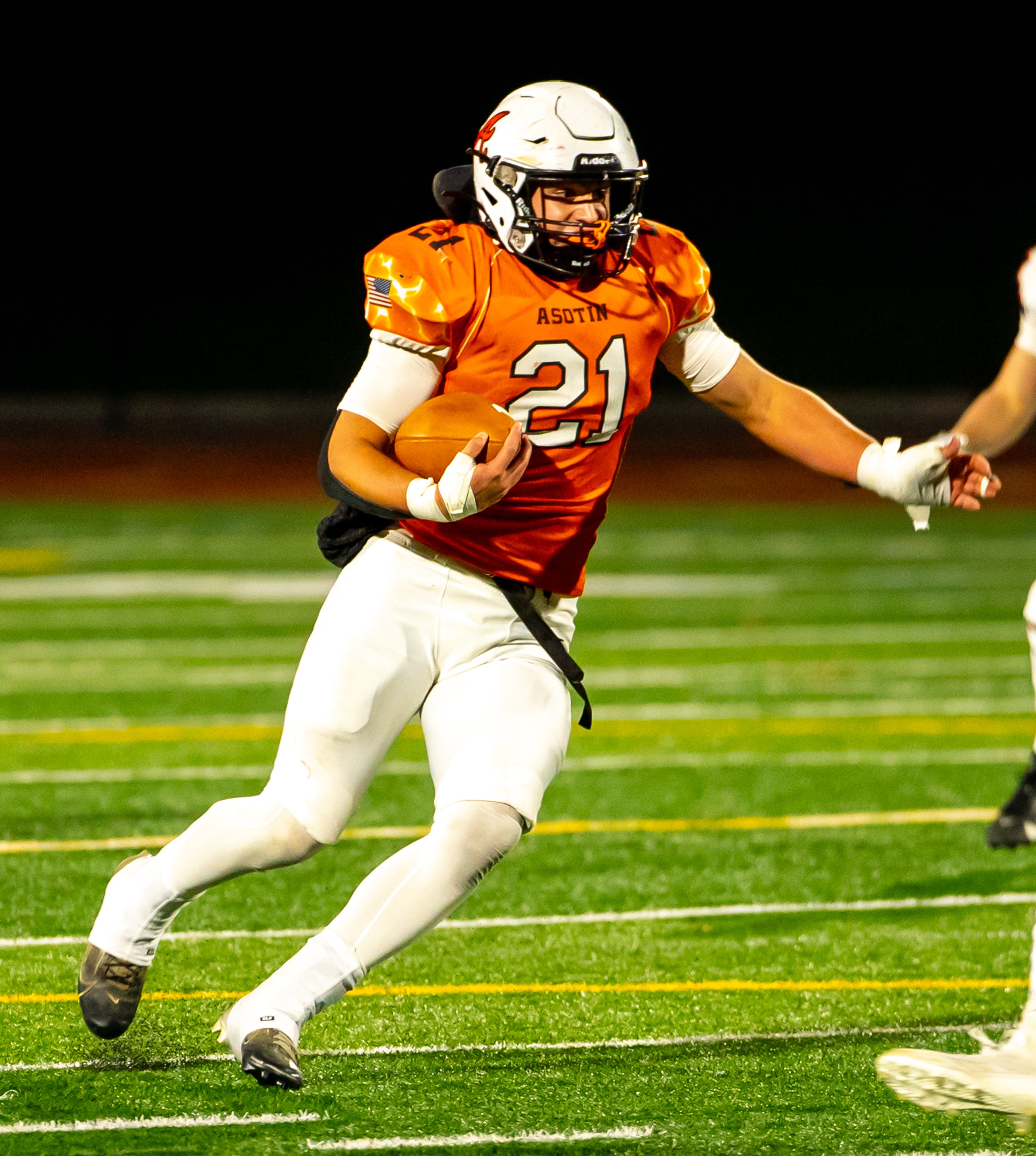 Asotin running back Colt Kelly runs the ball during a semifinal game against Napavine in the Washington 2B state tournament Saturday in Richland.