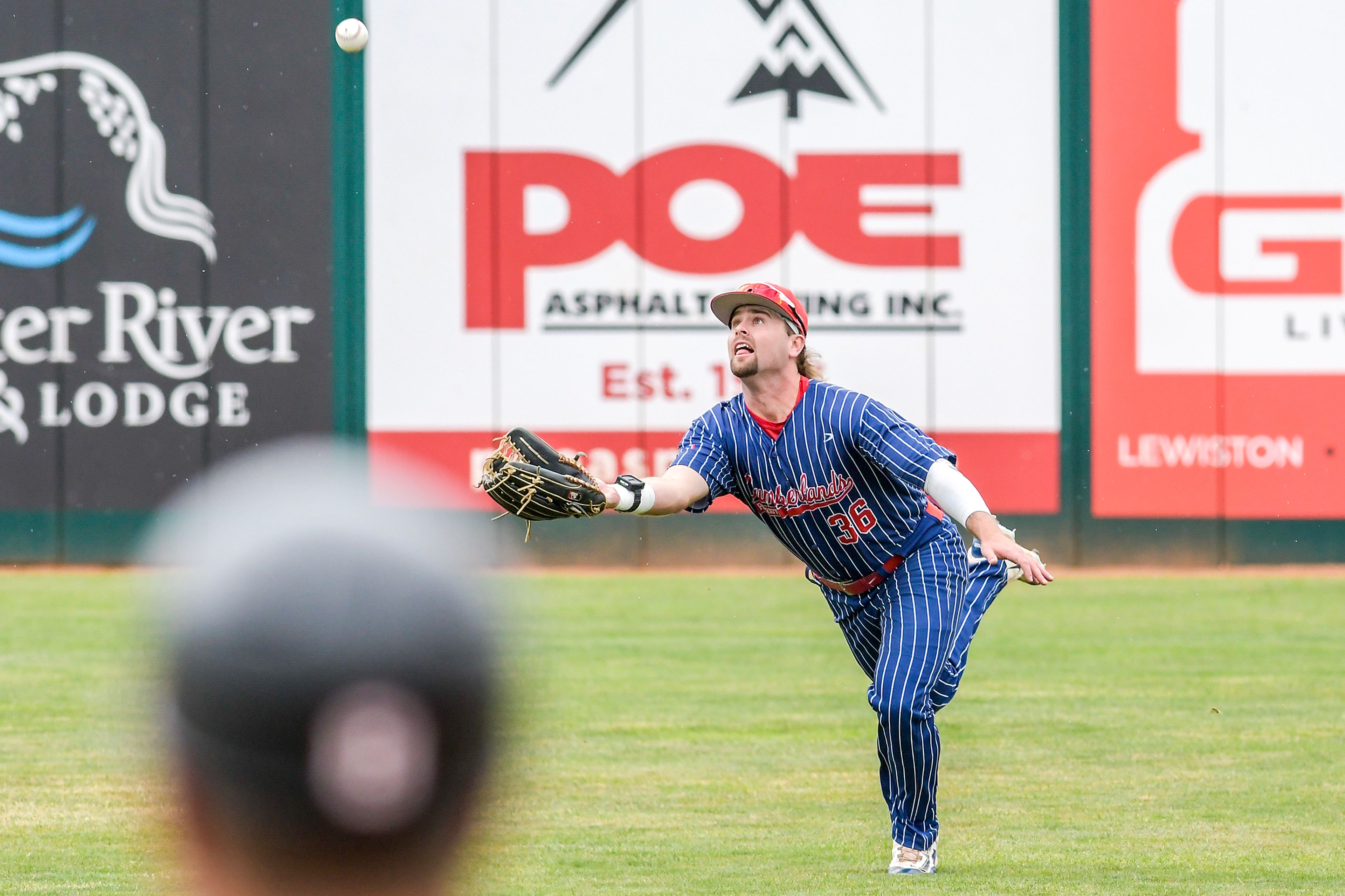 Cumberlands right fielder Trent Prokes runs after a ball to make a catch against William Carey in a game 6 of the NAIA World Series at Harris Field on Saturday in Lewiston.