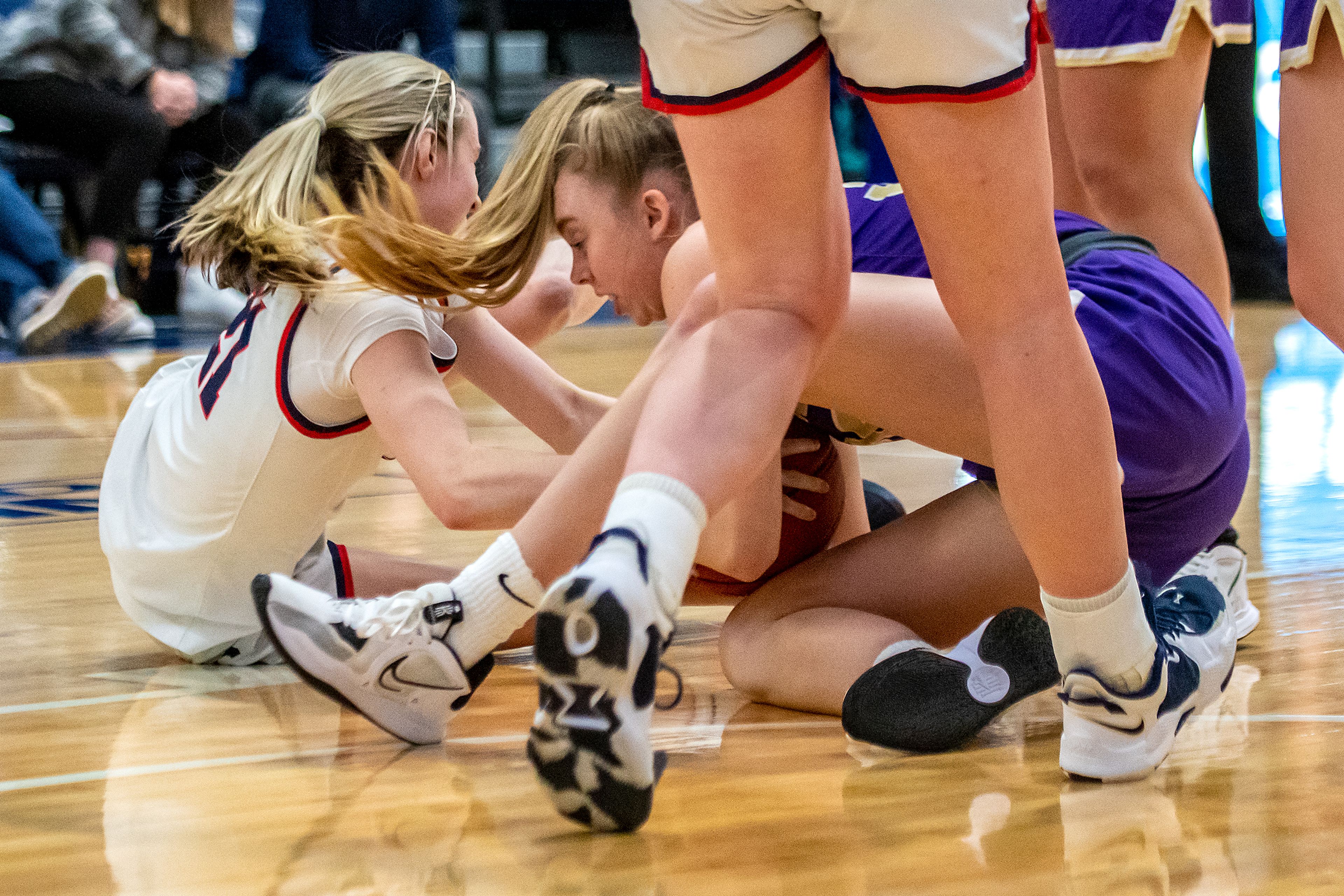 Lewis-Clark State guard Callie Stevens, left, scored 14 points in Saturday’s nonconference win against George Fox.