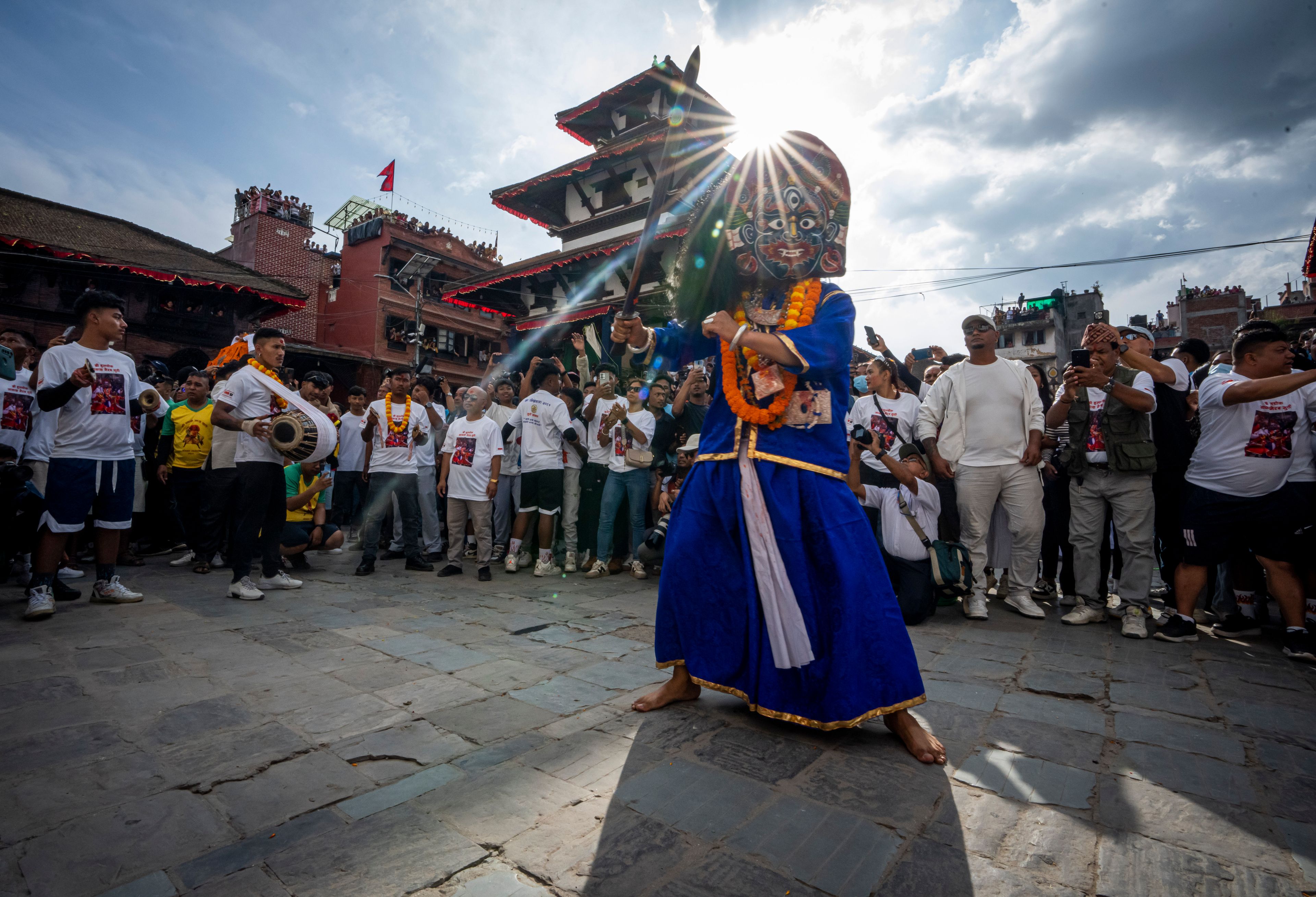 A masked dancer performs during Indra Jatra, a festival that marks the end of the rainy season in Kathmandu, Nepal, Tuesday, Sept. 17, 2024. (AP Photo/Niranjan Shrestha)