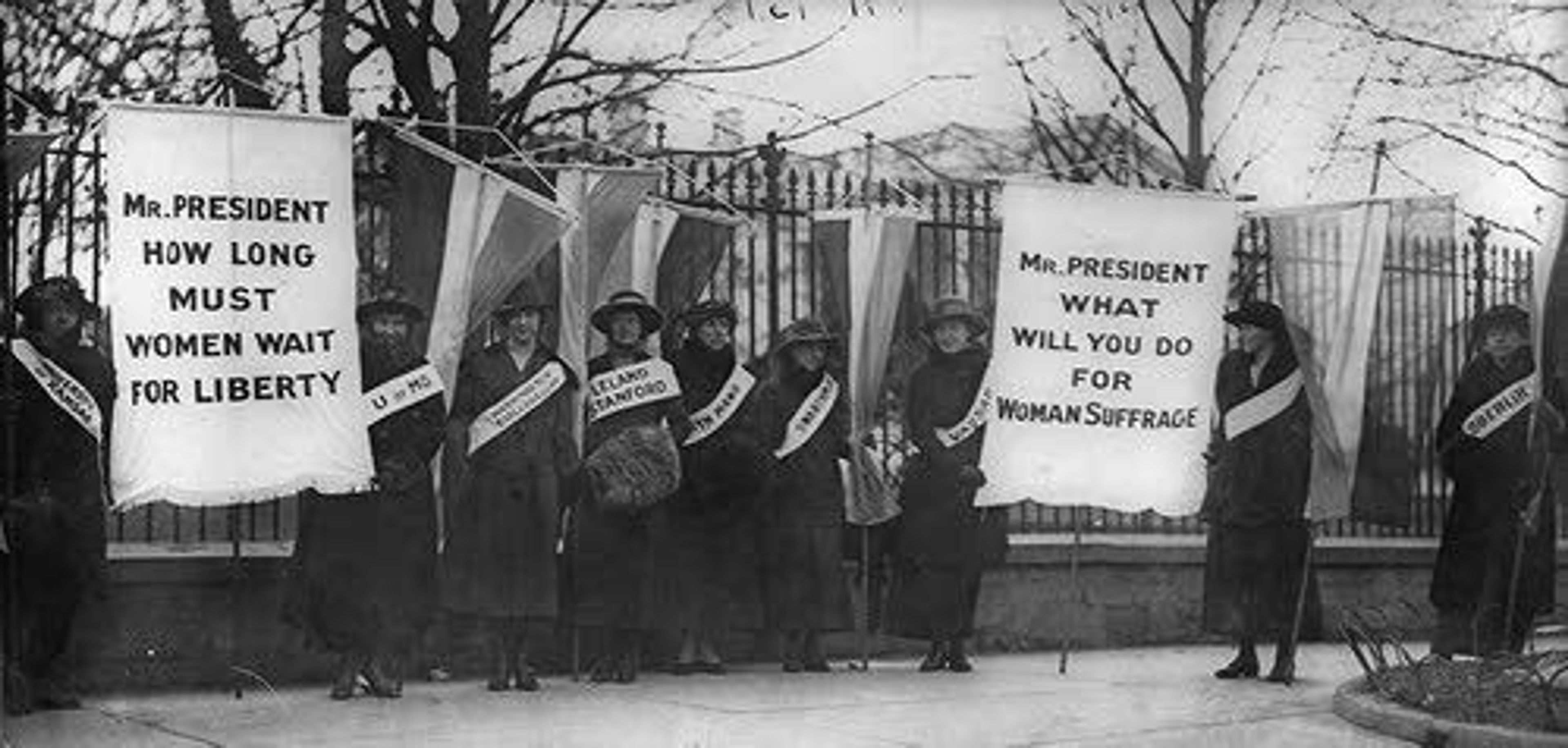 Women suffragists began a silent protest in Washington, D.C., in 1917.