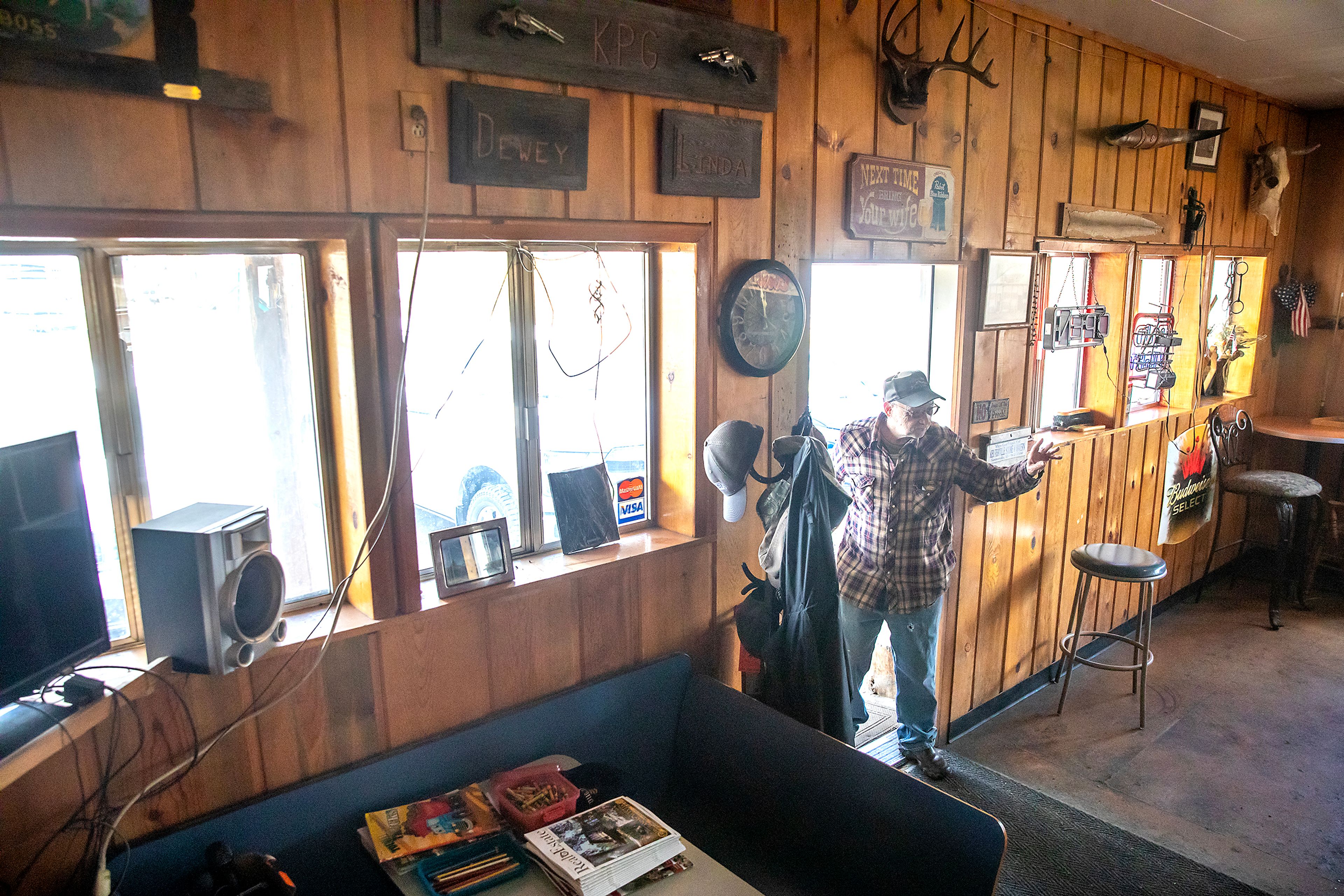 Erb Schnider waves as he enters the Keuterville Pub & Grub on Thursday.