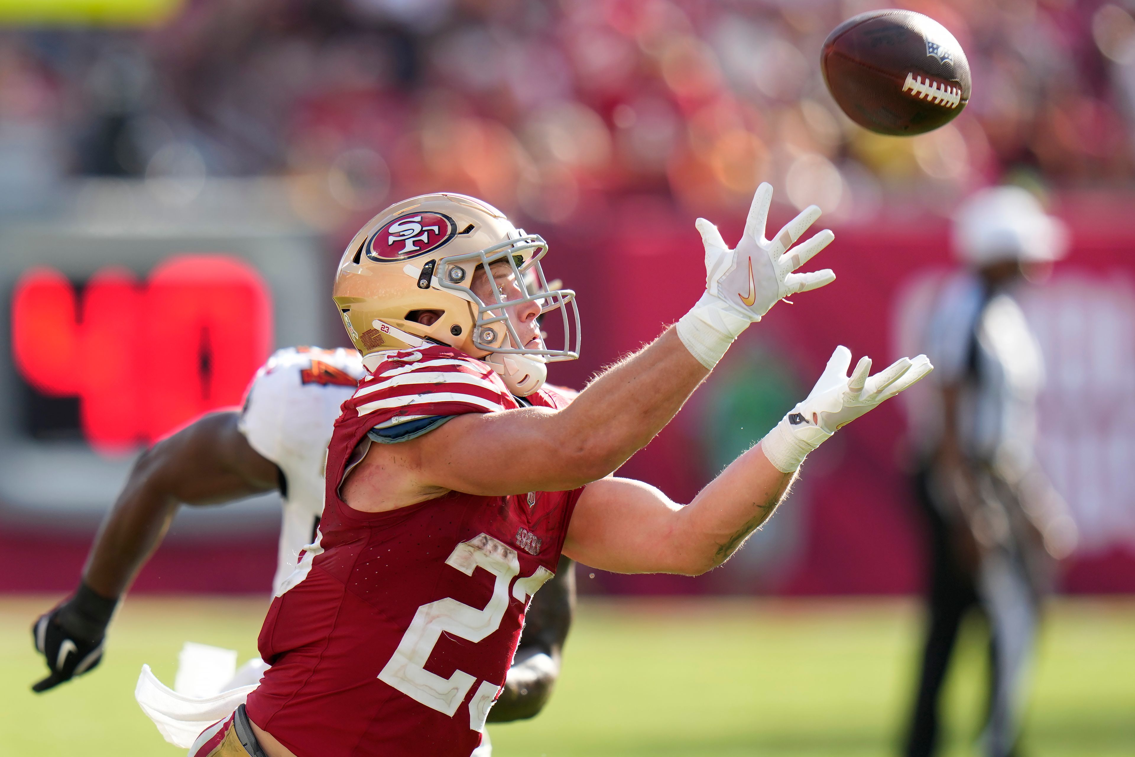 San Francisco 49ers running back Christian McCaffrey catches a pass against the Tampa Bay Buccaneers during the second half of an NFL football game in Tampa, Fla., Sunday, Nov. 10, 2024. (AP Photo/Chris O'Meara)