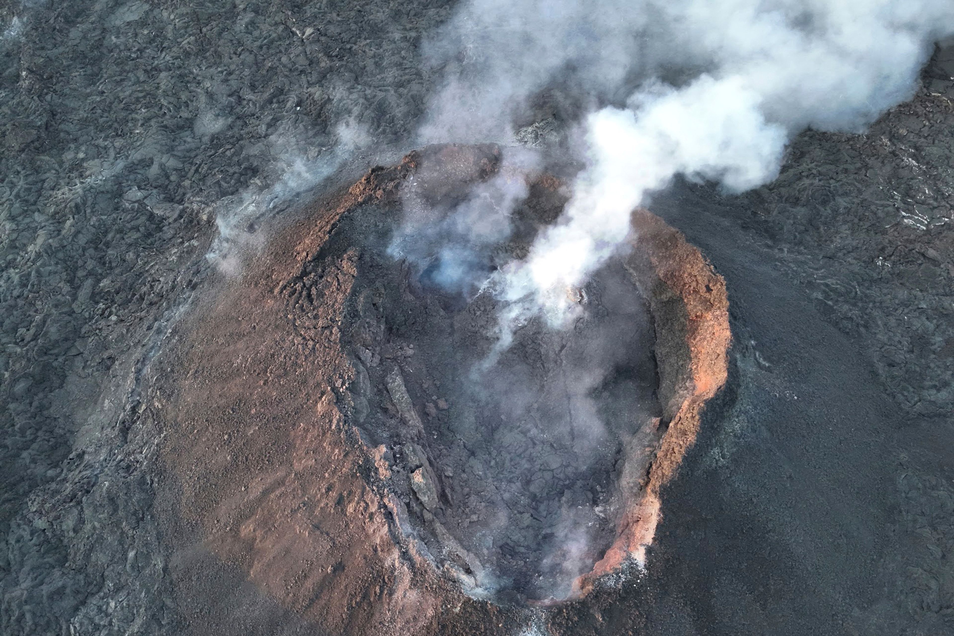 Smoke billows from a volcano in Grindavik, Iceland, Wednesday, May 29, 204. Wednesday, May 29, 2024. A volcano in southwestern Iceland is erupting, spewing red streams of lava in its latest display of nature’s power. A series of earthquakes before the eruption Wednesday triggered the evacuation of the popular Blue Lagoon geothermal spa. The eruption began in the early afternoon north of Grindavik, a coastal town of 3,800 people that was also evacuated.