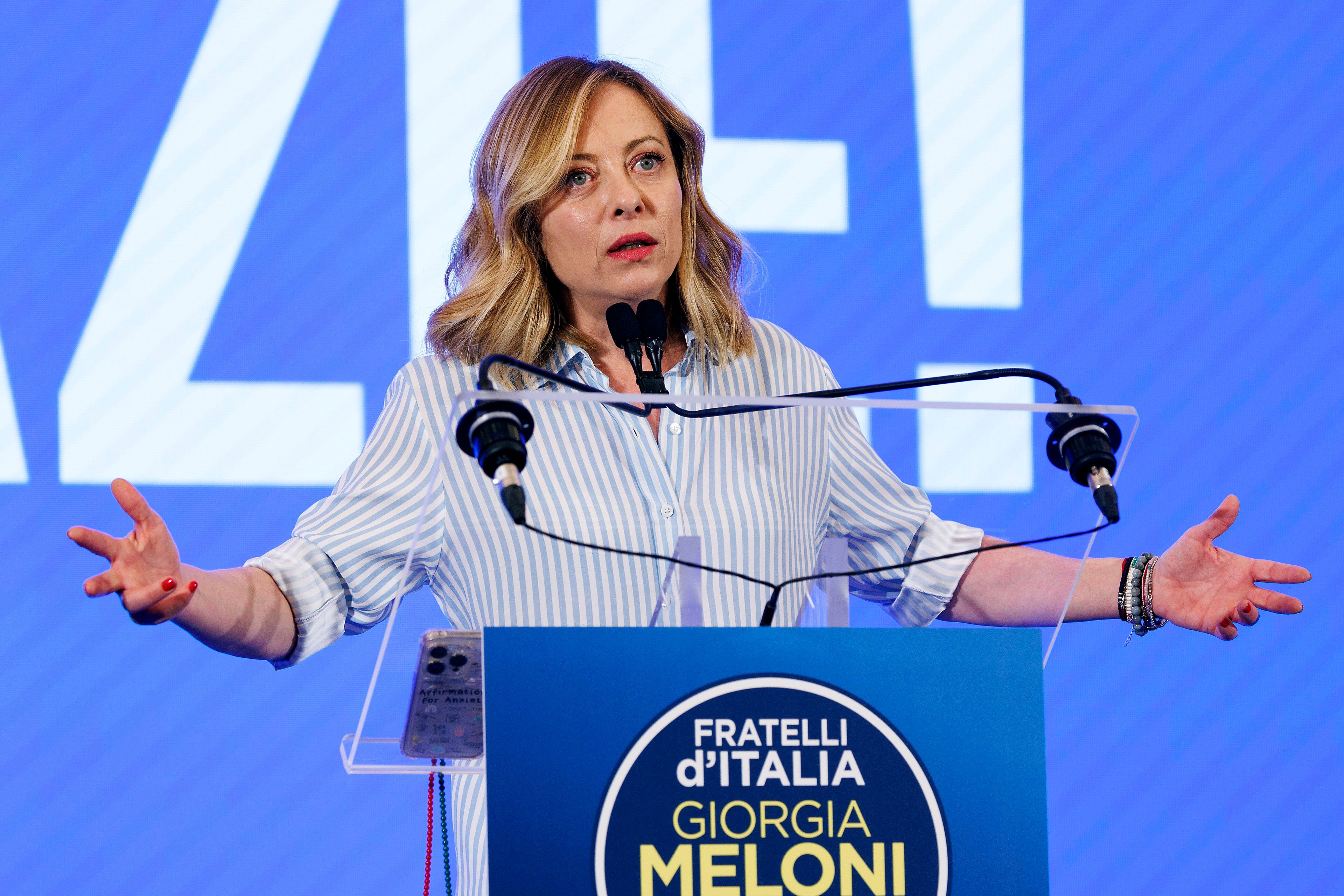 Italian Prime Minister Giorgia Meloni speaks about the results of the European Parliamentary elections at a press conference at the Fratelli d'Italia party electoral committee in Rome, Monday, June 10, 2024.