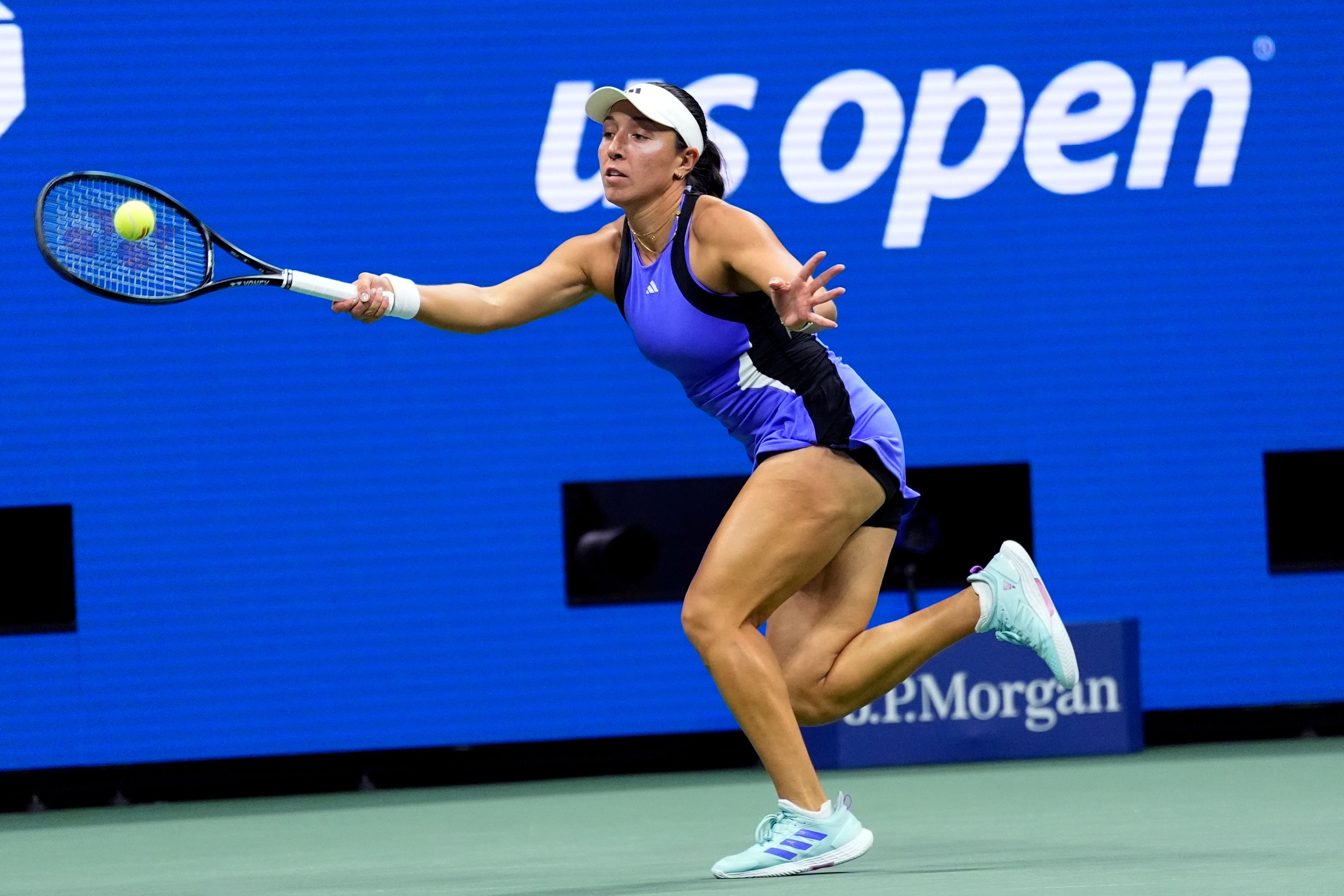 Jessica Pegula, of the United States, returns to Iga Świątek, of Poland, during the quarterfinals of the U.S. Open tennis championships, Wednesday, Sept. 4, 2024, in New York.