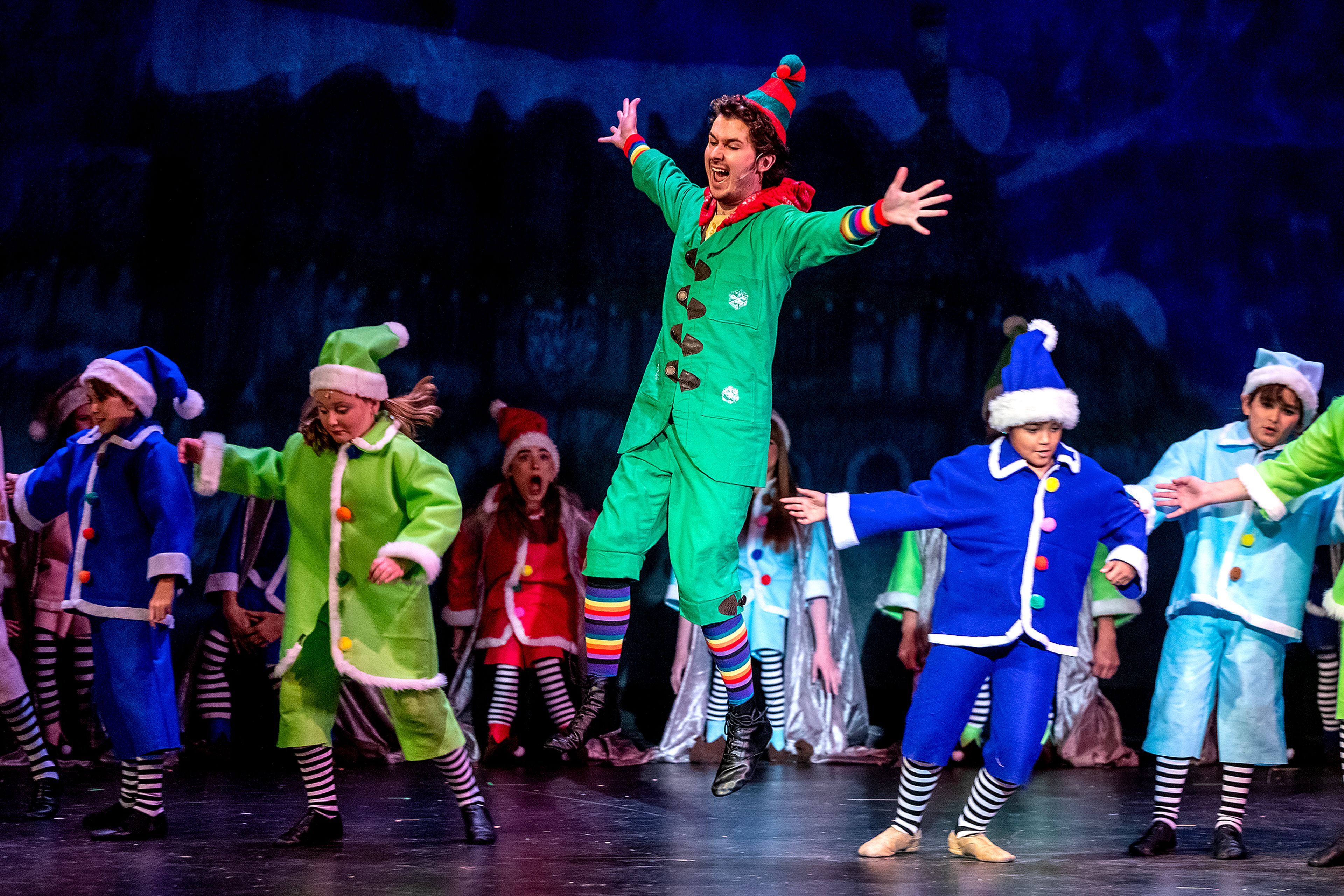 Buddy, played by Alex Everett, leaps out during his reveal at a rehearsal for the Civic Theatre production of “Elf” at the old Lewiston High School on Monday.