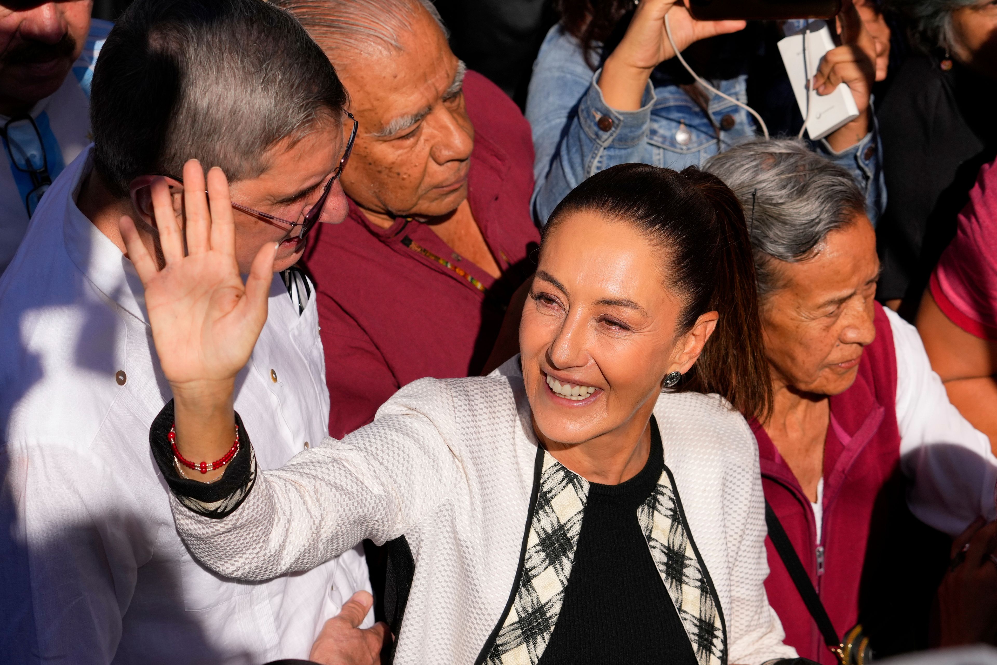 FILE - Ruling party presidential candidate Claudia Sheinbaum arrives to vote in the general election, in Mexico City, June 2, 2024. Sheinbaum, a climate scientist and former Mexico City mayor, will be sworn in as Mexicoâ€™s first woman president on Oct. 1. (AP Photo/Matias Delacroix, File)