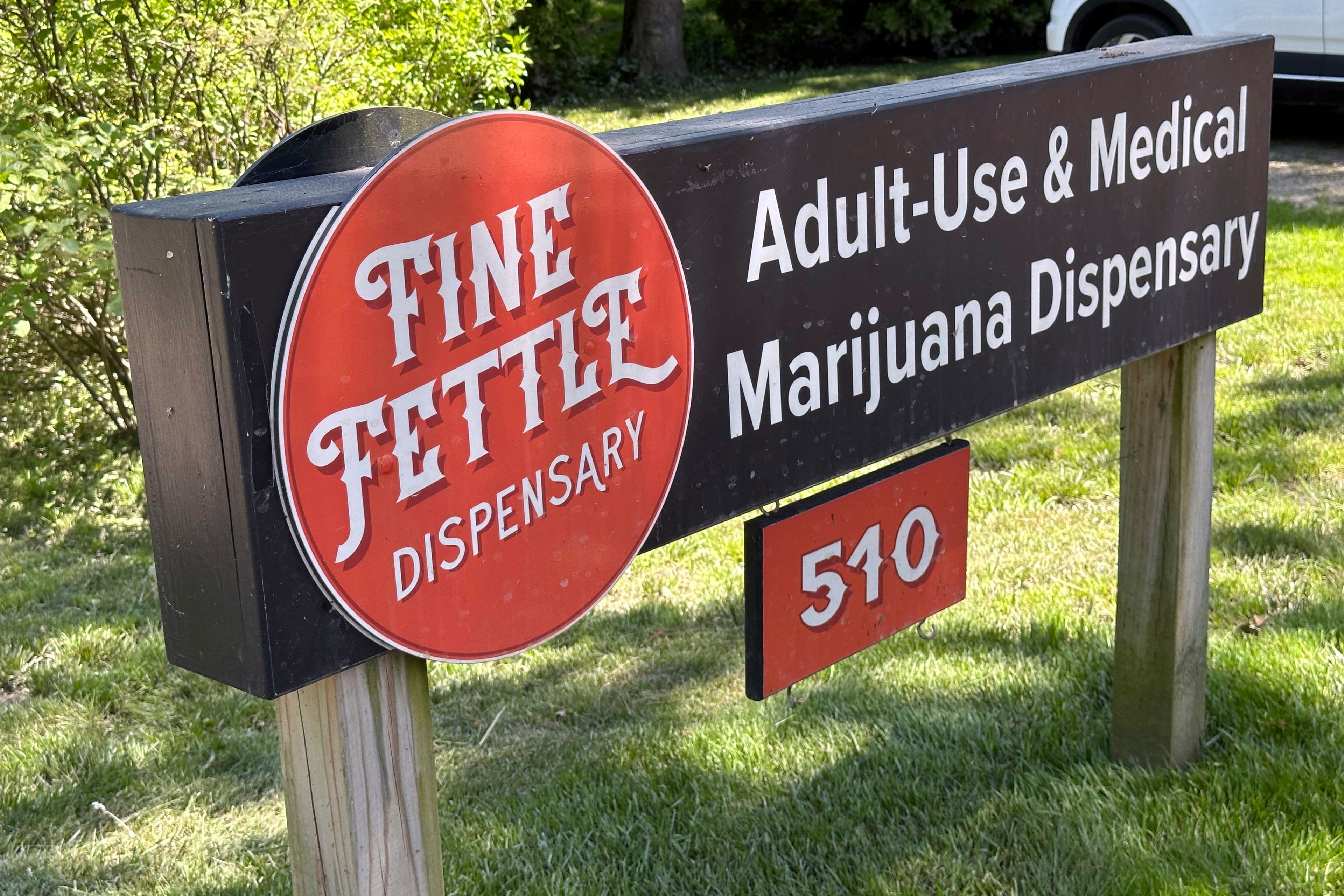 A sign advertises the Fine Fettle cannabis dispensary on June 4, 2024, in West Tisbury, Mass.. Unless something changes, Martha's Vineyard is about to run out of pot, affecting more than 230 registered medical users and thousands more recreational ones.