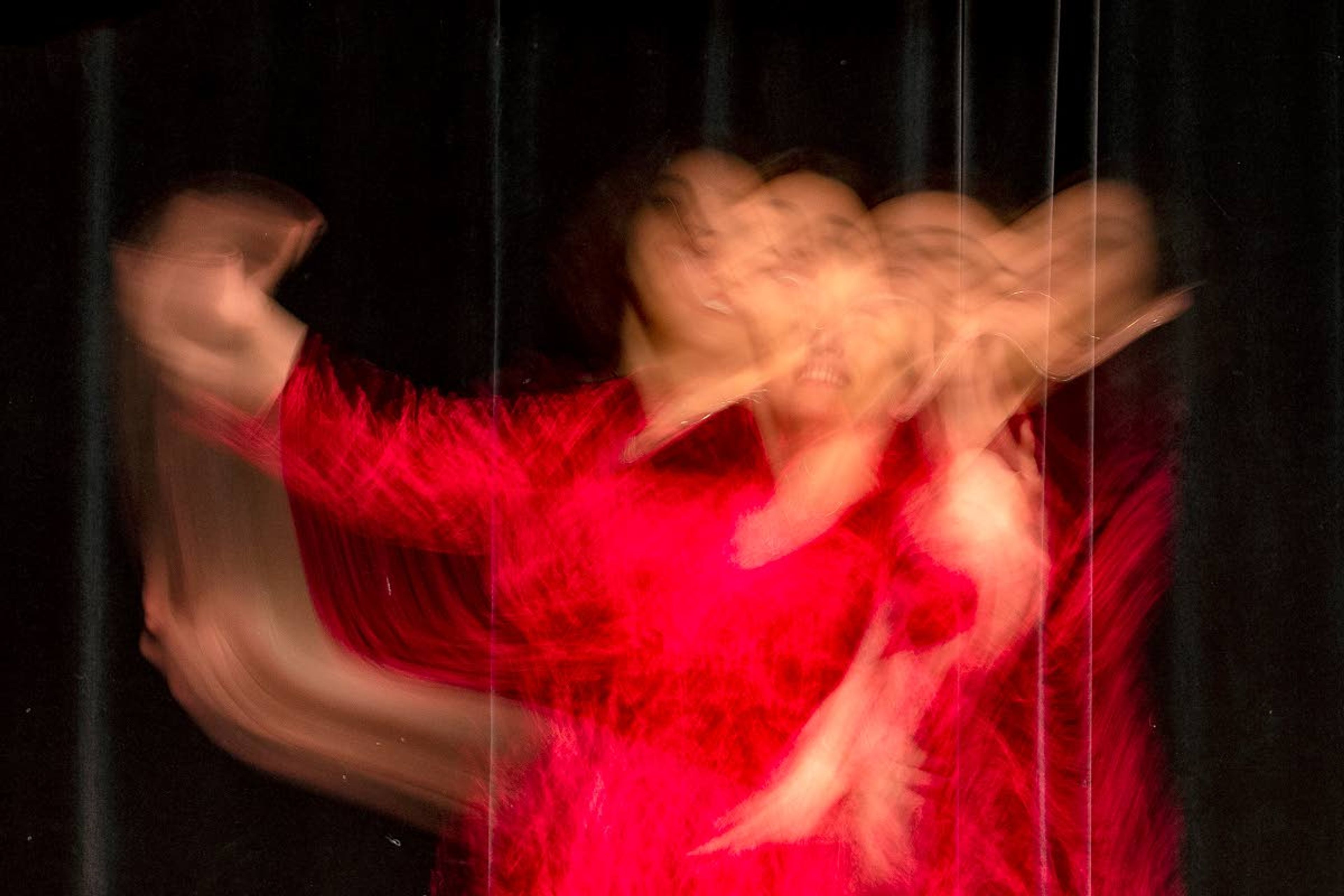 In this long exposure photograph, Maryam Abbasi, a PhD student in the natural resources studies program, performs an Iranian Azeri dance during the University of Idaho’s Cruise the World event on Saturday at the Pitman Center in Moscow.