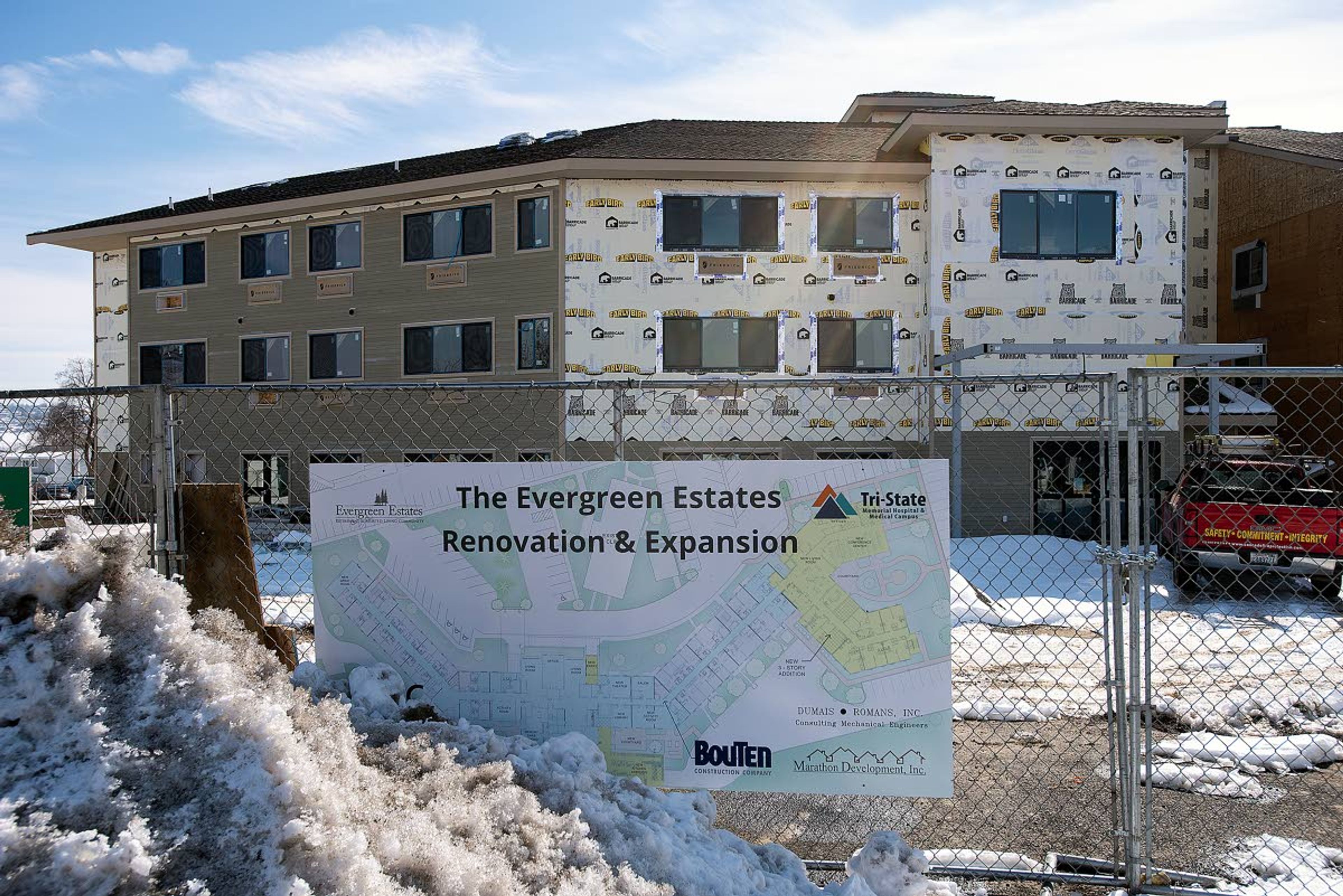 The area east of the Evergreen Estates retirement home is fenced off as construction of its expansion continues in Clarkston.