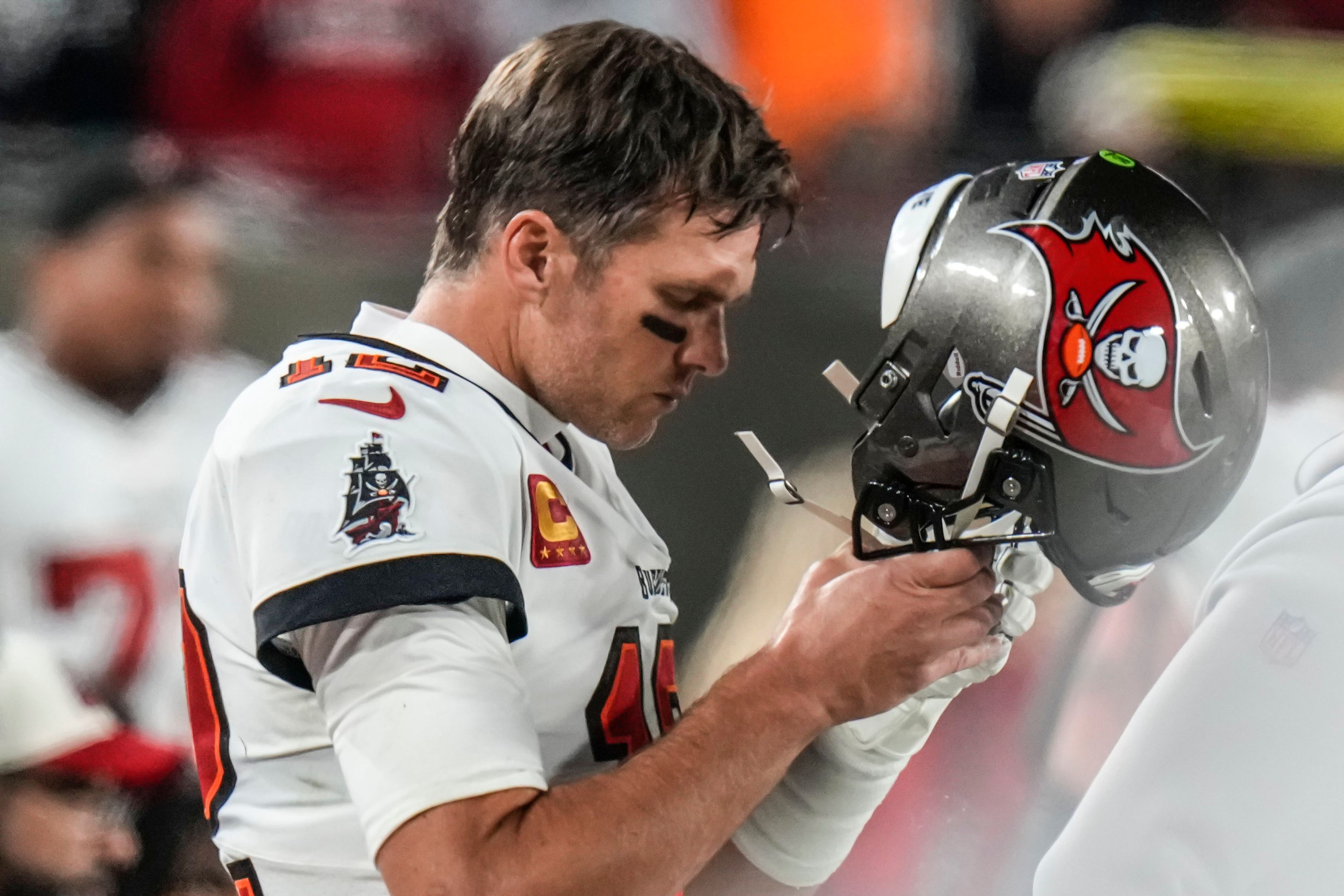 Tampa Bay Buccaneers quarterback Tom Brady (12) walks on the sidelines during the second half of an NFL wild-card football game against the Dallas Cowboys, Monday, Jan. 16, 2023, in Tampa, Fla. (AP Photo/Chris O'Meara)