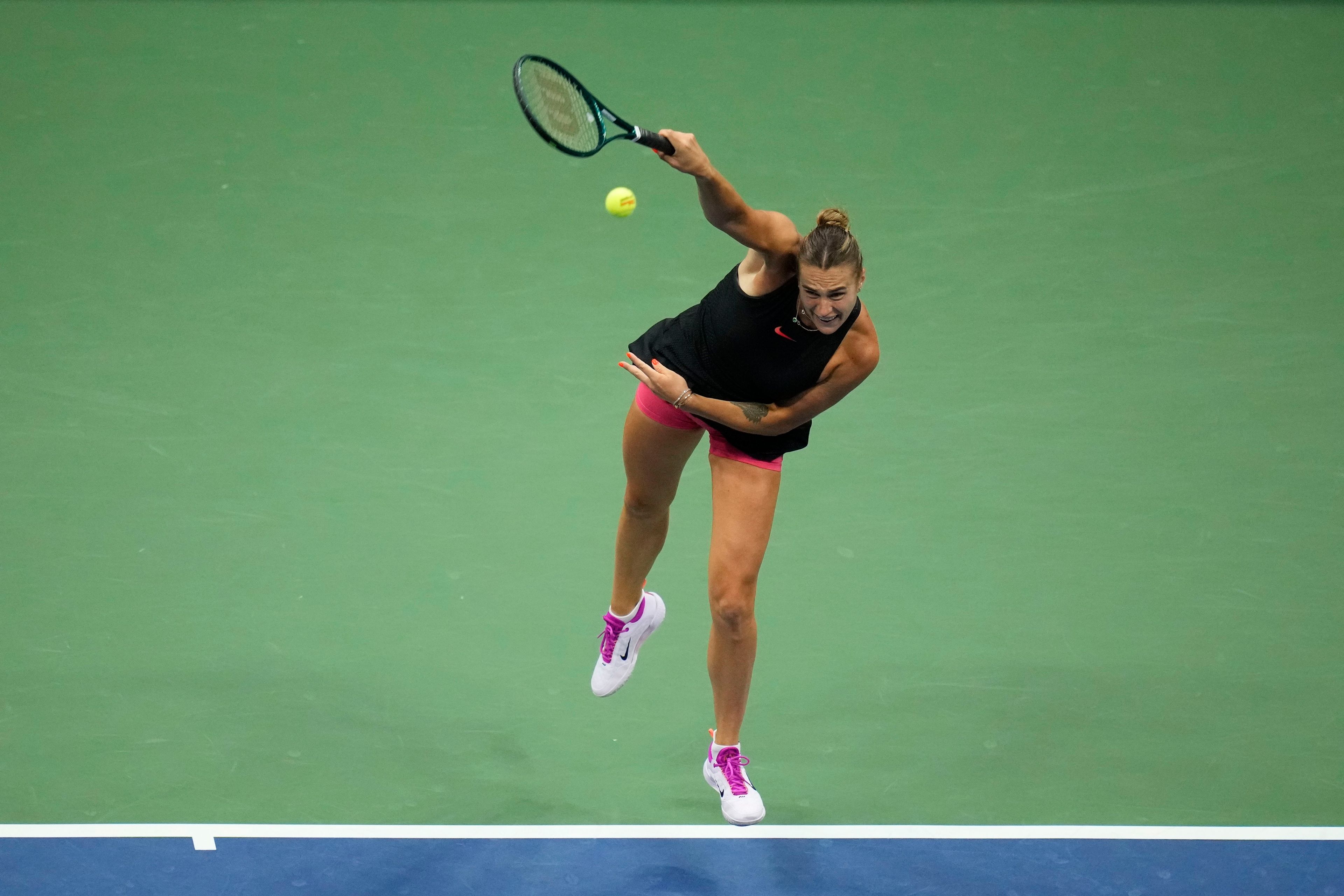 Aryna Sabalenka, of Belarus, serves to Emma Navarro, of the United States, during a semifinal match of the U.S. Open tennis championships, Thursday, Sept. 5, 2024, in New York.