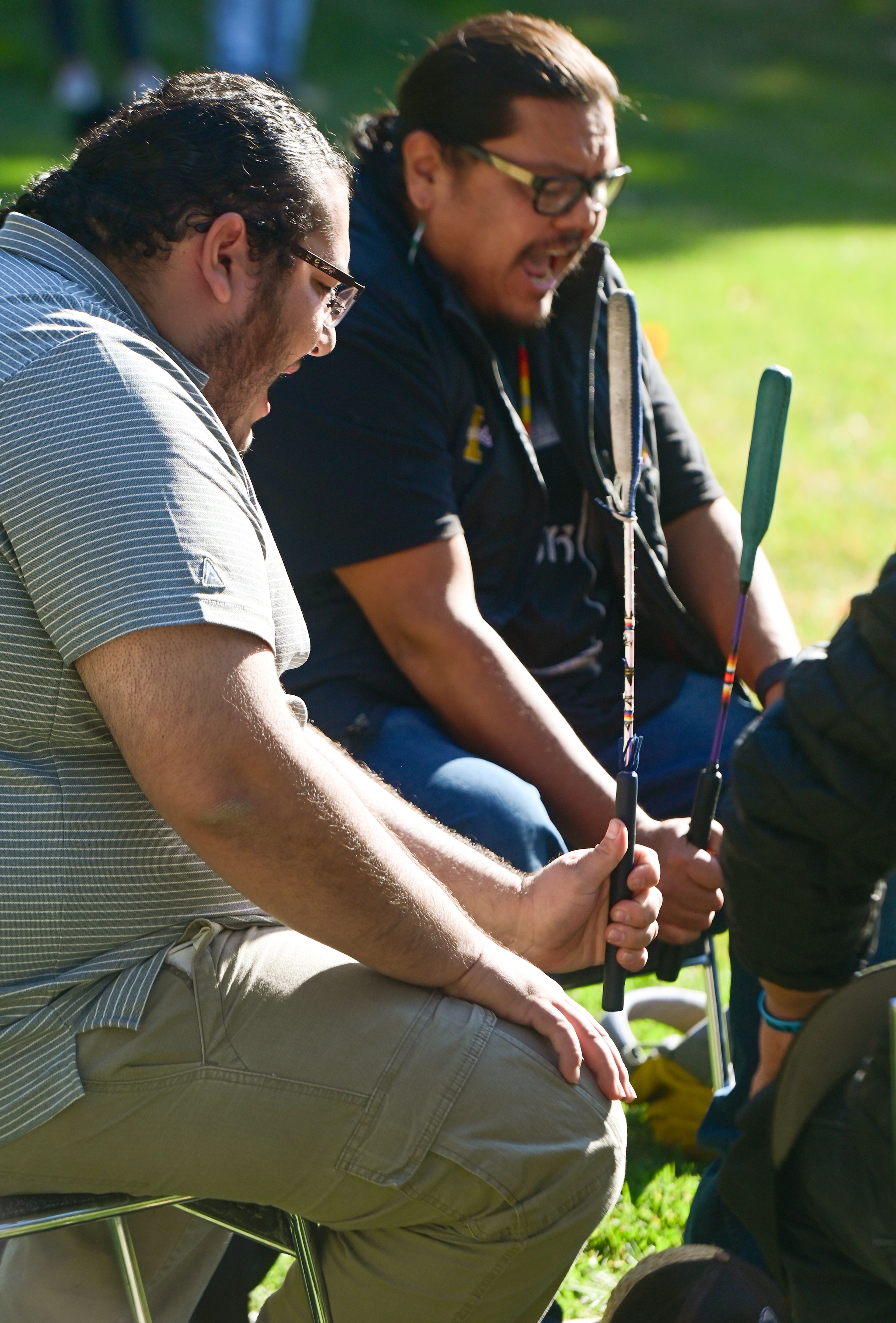 Lance Dick Jr., left, and Moots Keo, members of the Vandal Nation Drum Group, perform songs for round dances Monday during the Indigenous Peoples Day event hosted by the University of Idaho Native American Student Center on campus in Moscow.