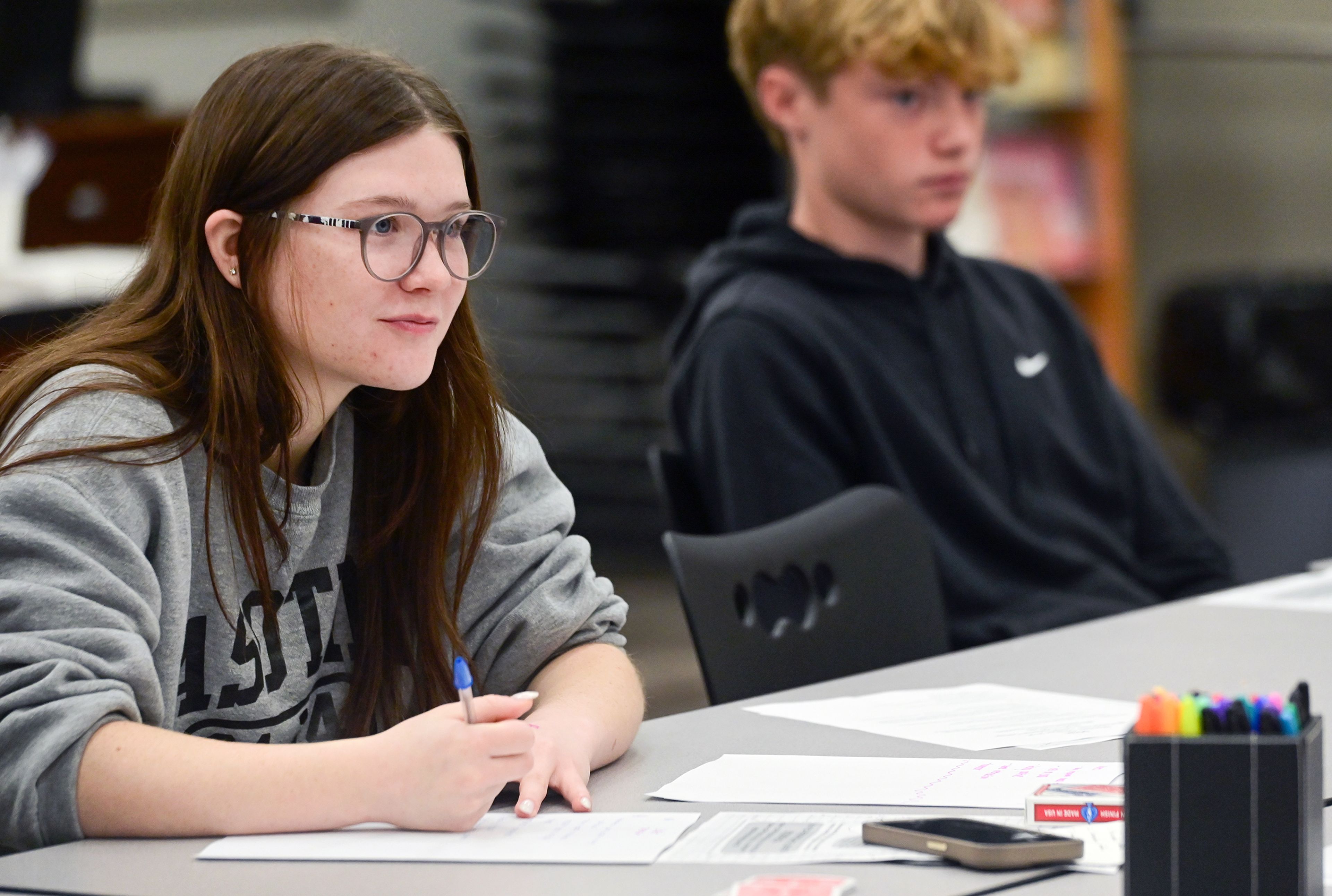 Kelsey Thummel, a senior at Asotin High School, takes notes on a discussion at the Students of the Valley Advocacy meeting Monday at AHS.,