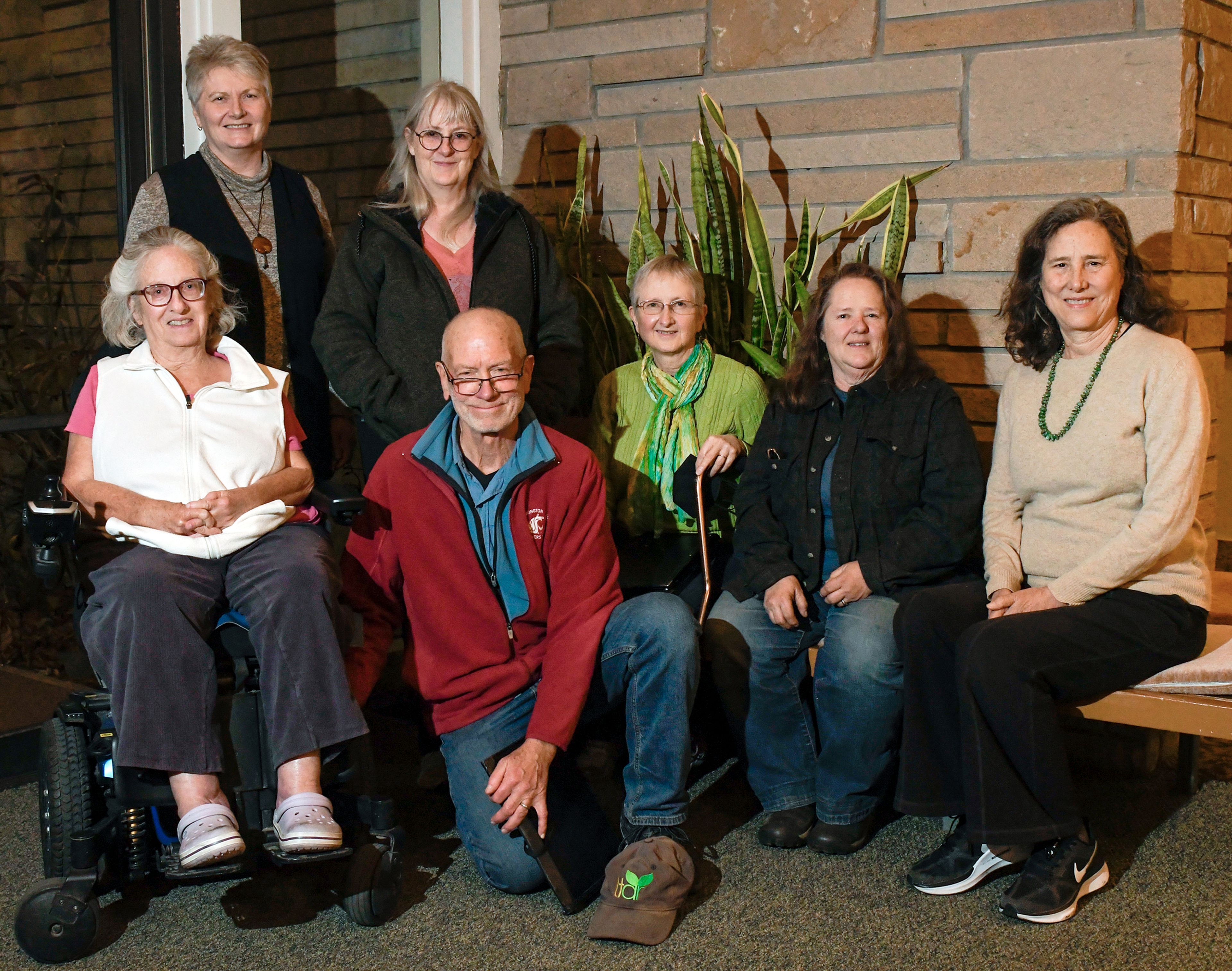 Longtime members of the Palouse Choral Society Holly McCollister, front row from left, Kent Keller, Terry Keller, Janice Willard, Monique Lillard, Karen Weathermon, back row from left, and Jill Freuden, gather for a photo Monday during a rehearsal at Simpson United Methodist Church in Pullman.