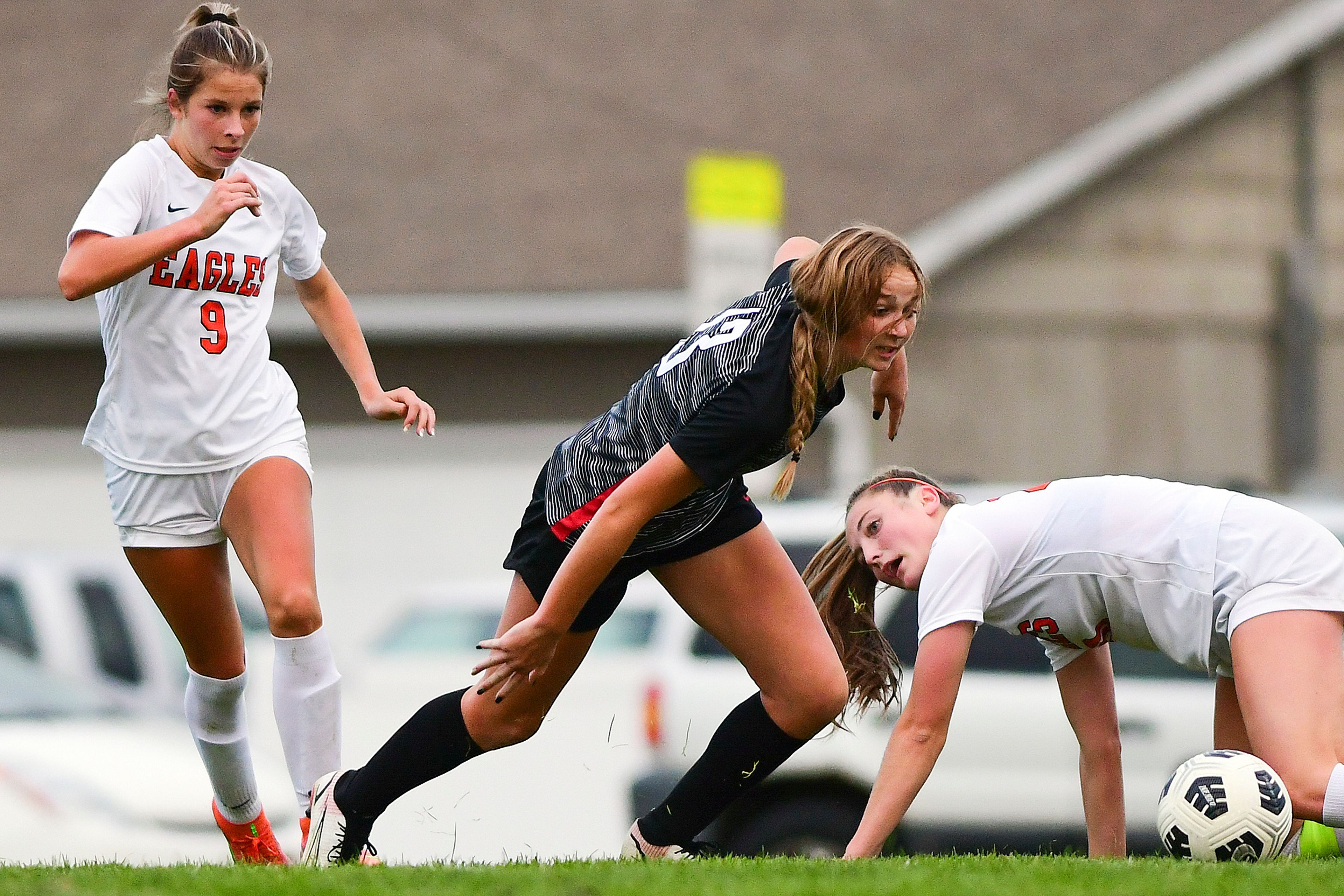 Clarkston�s Rebecca Skinner battles through a tackle by West Valley�s Madison Carr (righ) as Taylor Steven follows the play during the second half of a Greater Spokane League soccer game on Oct. 14, 2021, in Clarkston.