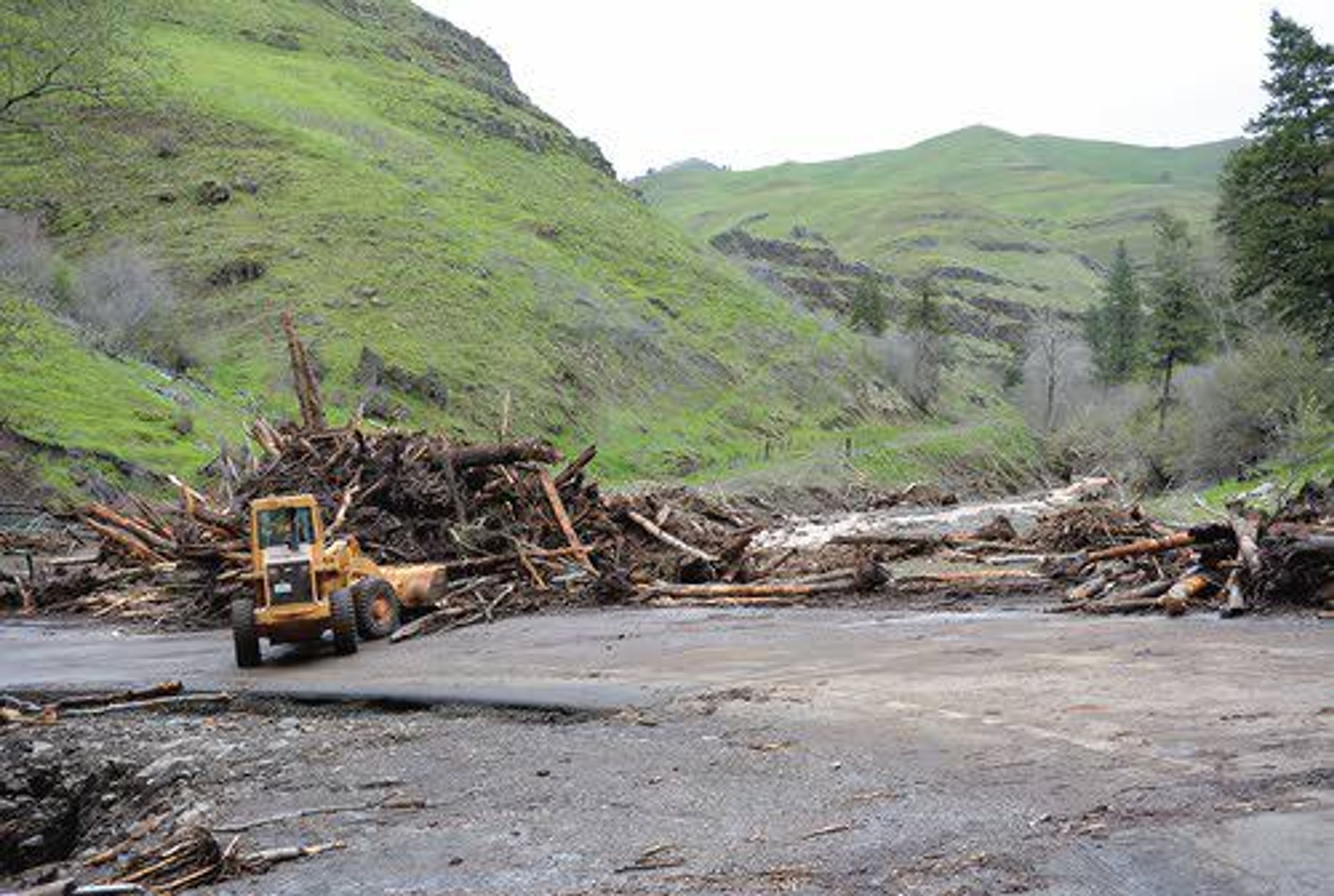 The origin of the landslide that swept State Route 129 likely was a private pond upstream of Rattlesnake Creek.