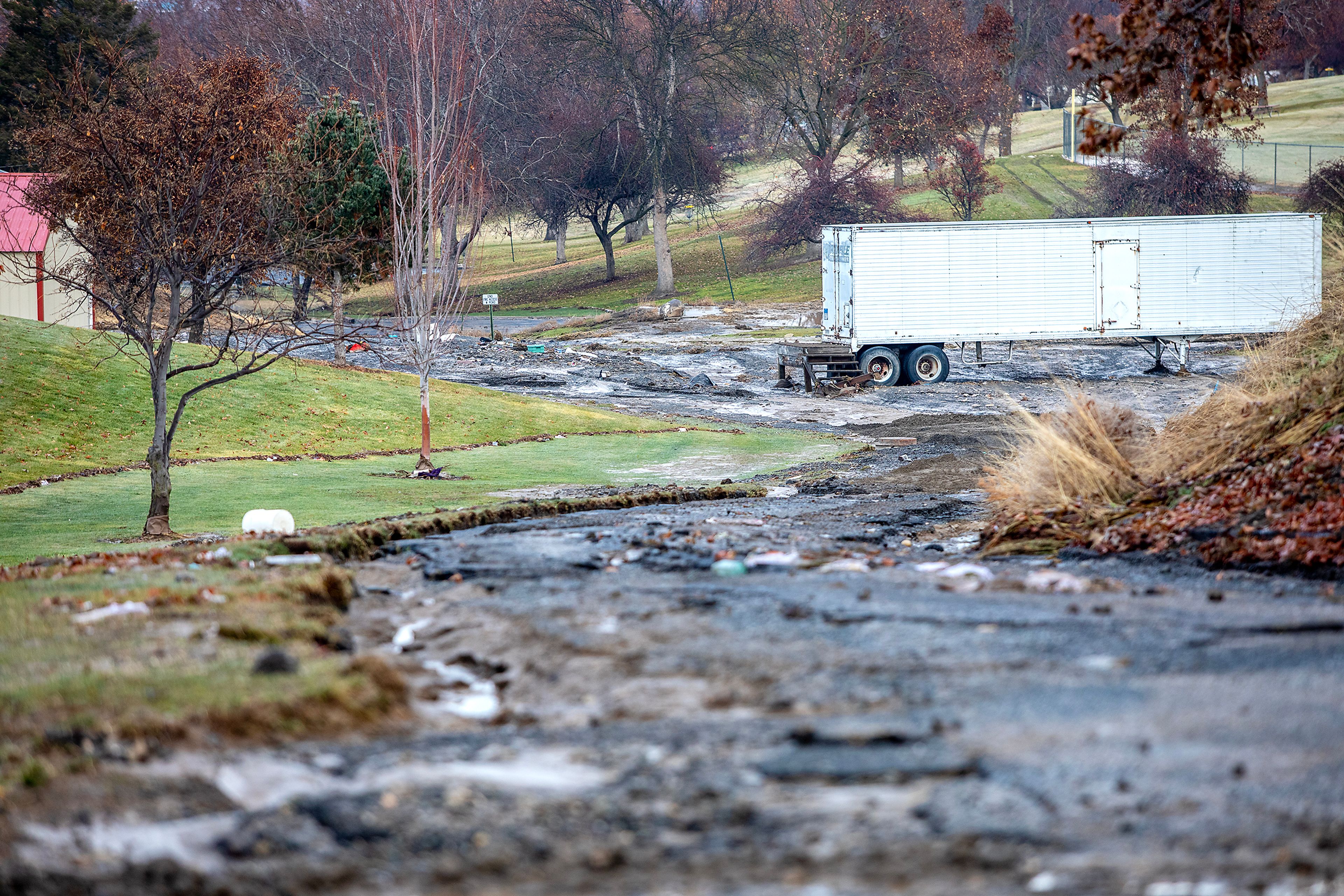 The path water took is seen moving towards the outskirts of Sunset Park after a water reservoir at the corner of 16th Avenue and 29th Street burst in the early hours of Wednesday morning in Lewiston.