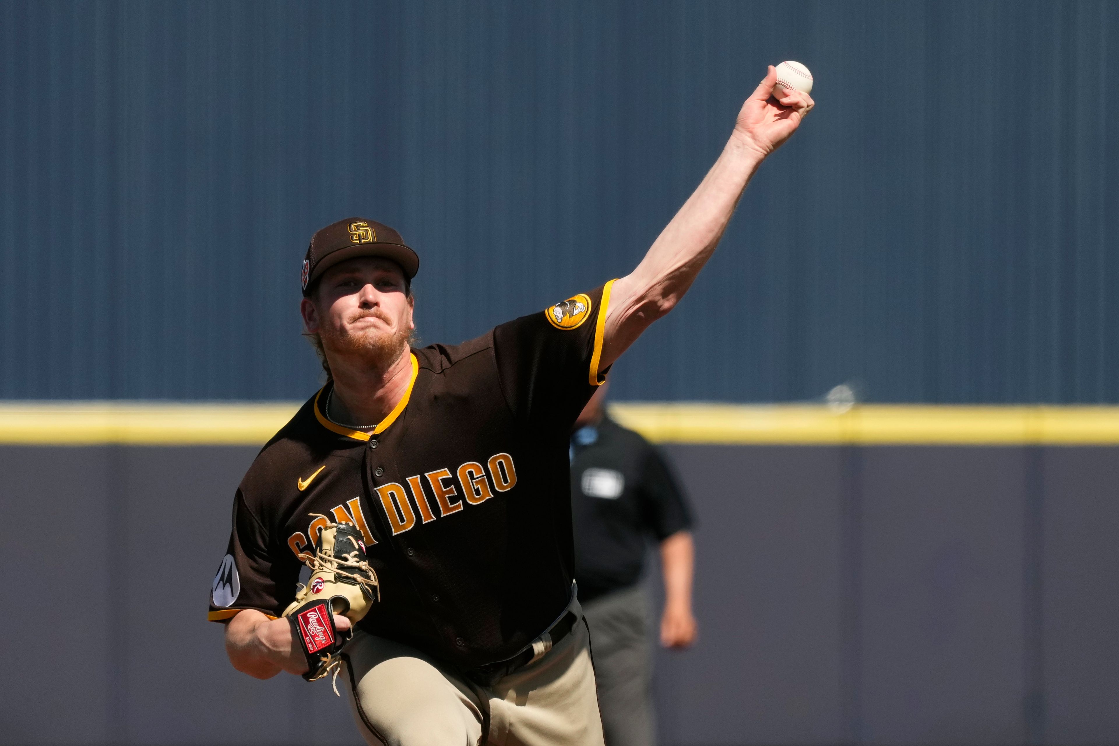 FILE - San Diego Padres starting pitcher Jay Groome throws against the Milwaukee Brewers during the second inning of a spring training baseball game Thursday, March 23, 2023, in Phoenix. Major League Baseball, on Tuesday, June 4, 2024, banned Groome for one year after finding the player placed unrelated bets with a legal sportsbook.