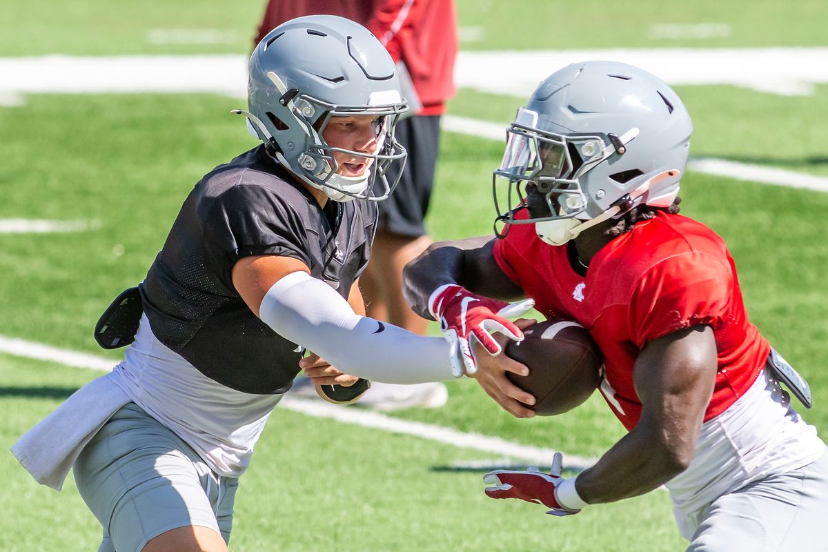 Four-man quarterback race provides unique challenge to Coug coaching staff