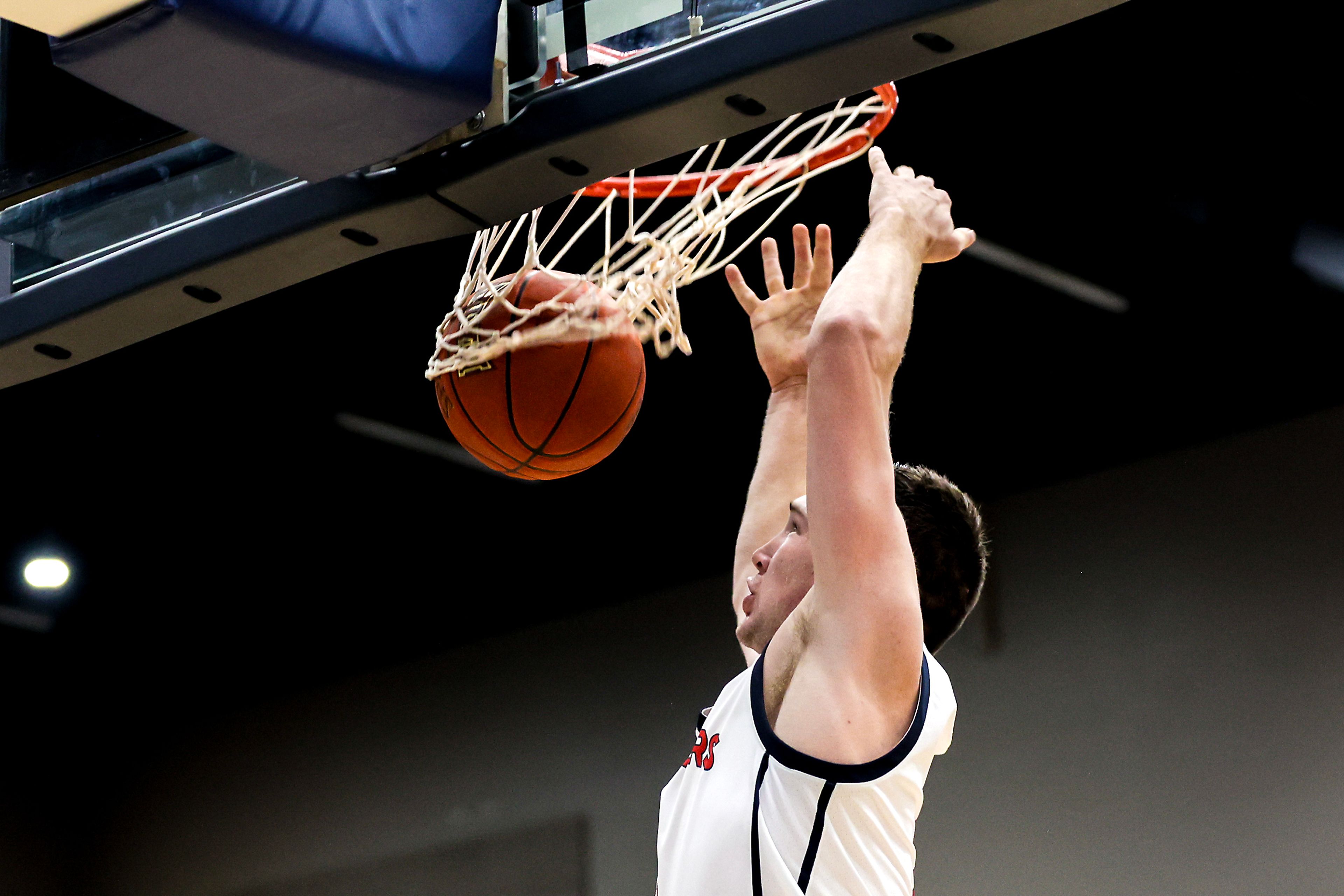 Lewis-Clark State guard John Lustig dunks the ball against Walla Walla during a quarter of a Cascade Conference game Tuesday at Lewis-Clark State College in Lewiston.