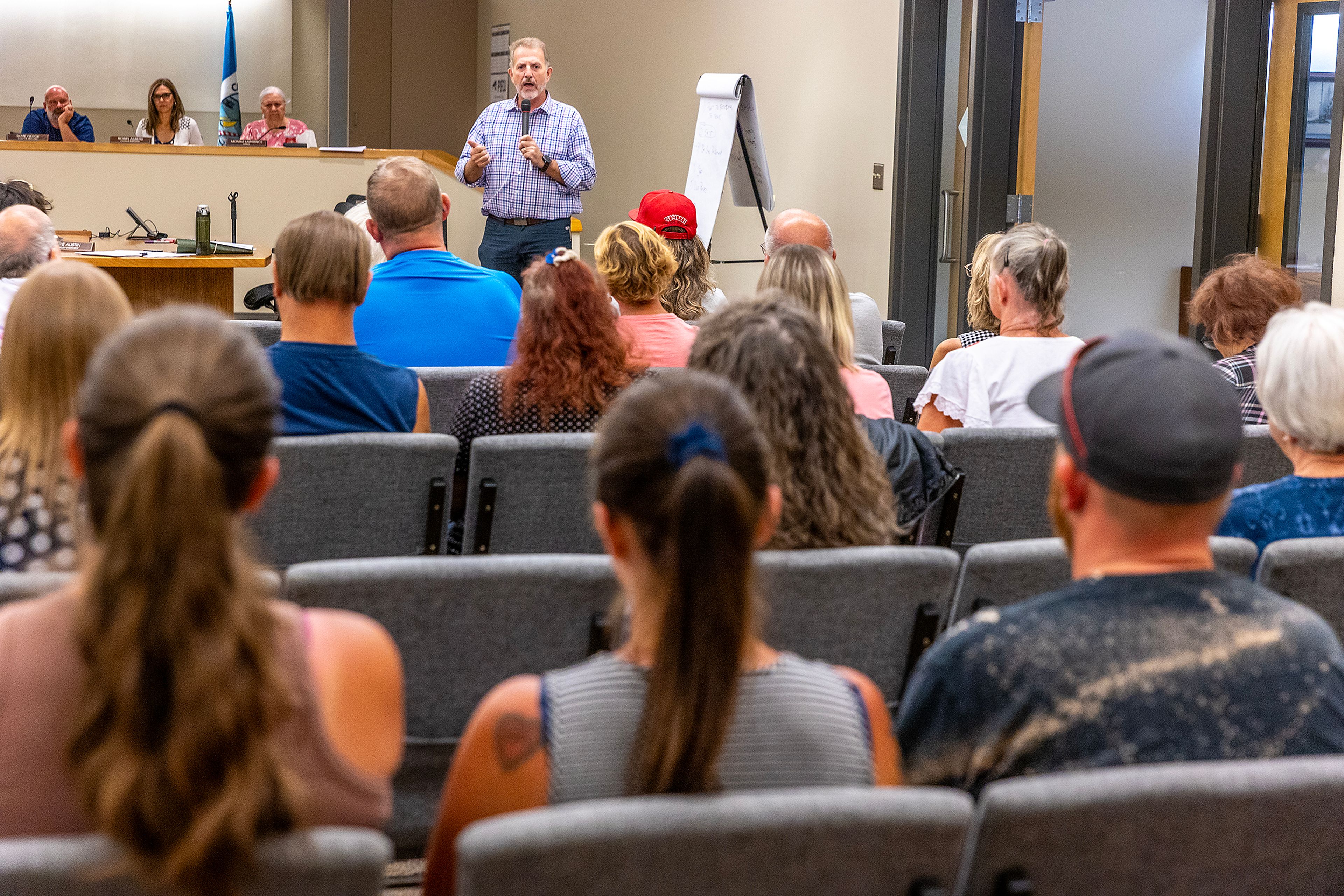 Interim City Attorney Todd Richardson gives a presentation about the lawsuit the City of Clarkston and other cities are facing during a city council meeting Monday in Clarkston.