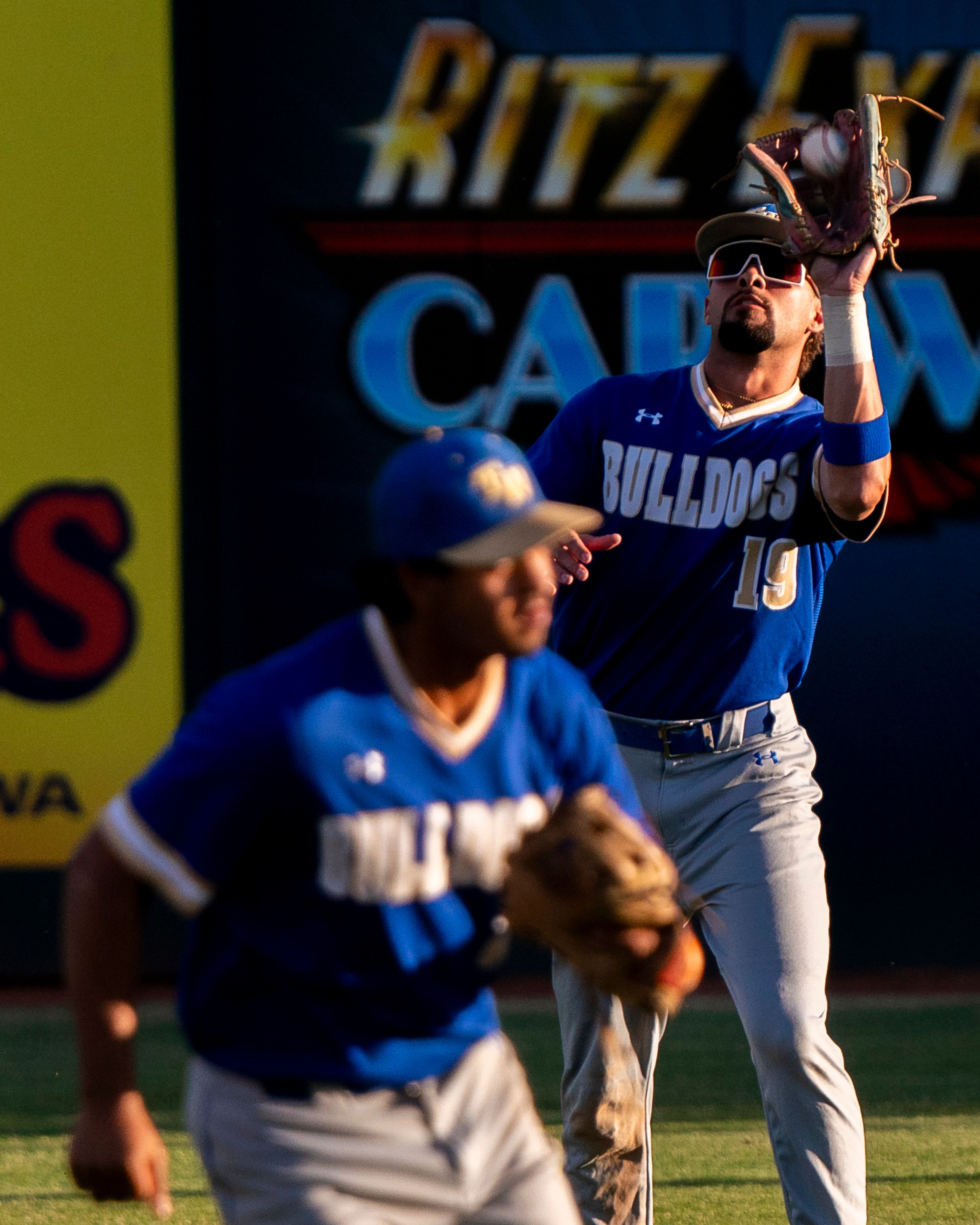 Tennessee Wesleyan’s Kruise Newman (19) catches a fly ball during Game 19 of the NAIA World Series against Hope International on Friday at Harris Field in Lewiston.