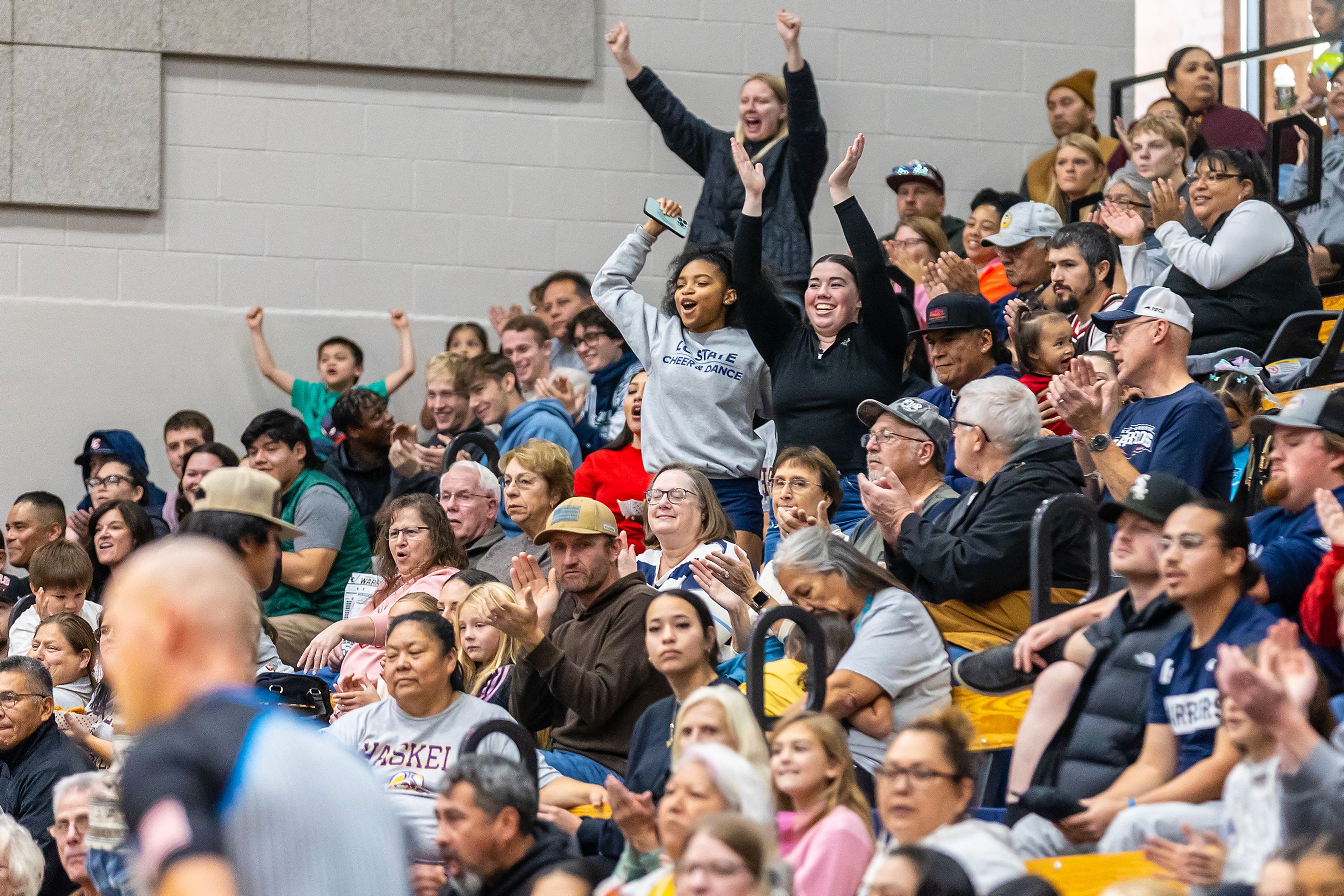 Fans cheer on Lewis-Clark State women�s team against Haskell during the season opening game as part of Tribal Nations Weekend Saturday in Lewiston.,