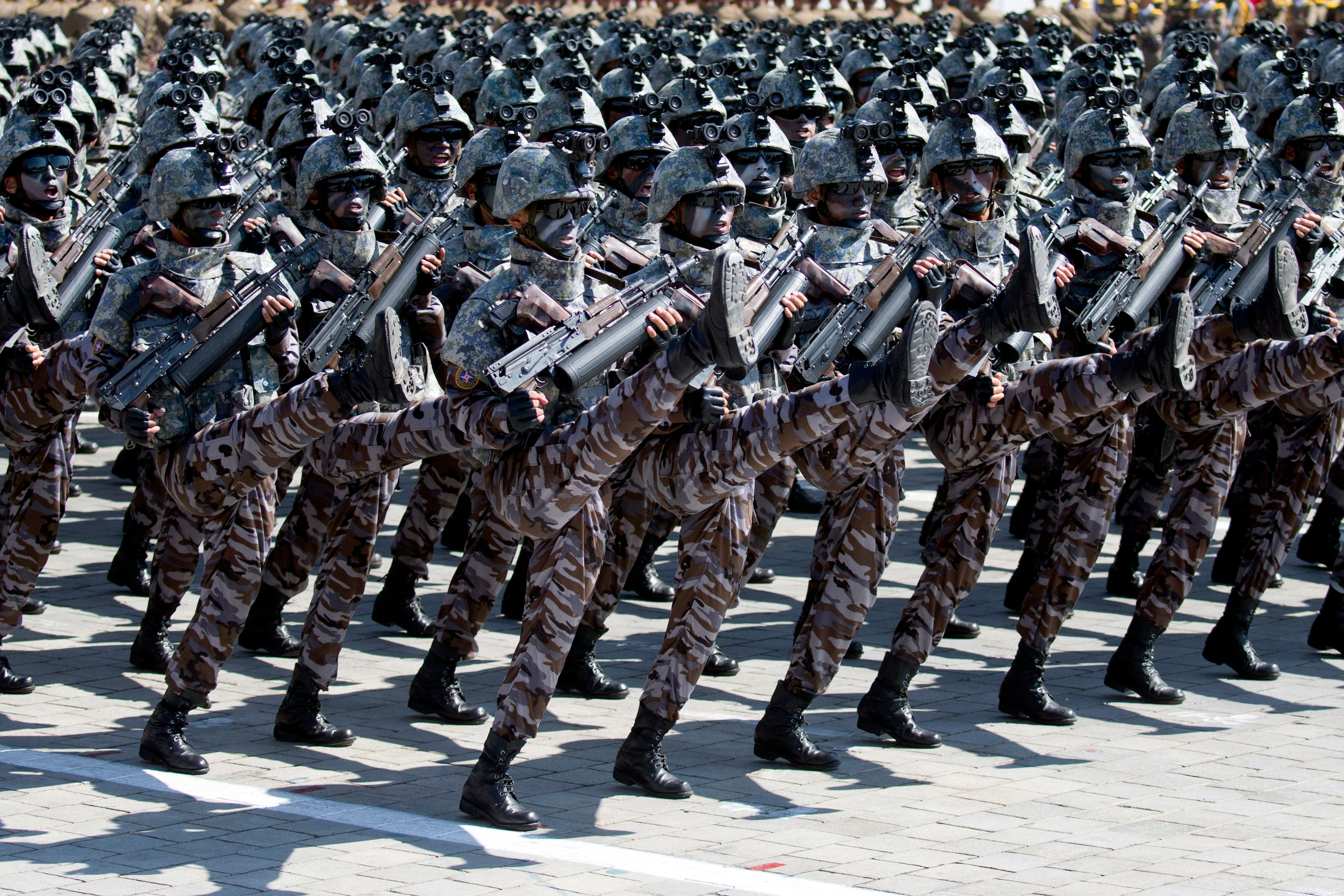 FILE - Soldiers march in a parade for the 70th anniversary of North Korea's founding day in Pyongyang, North Korea, on Sept. 9, 2018. (AP Photo/Ng Han Guan, File)