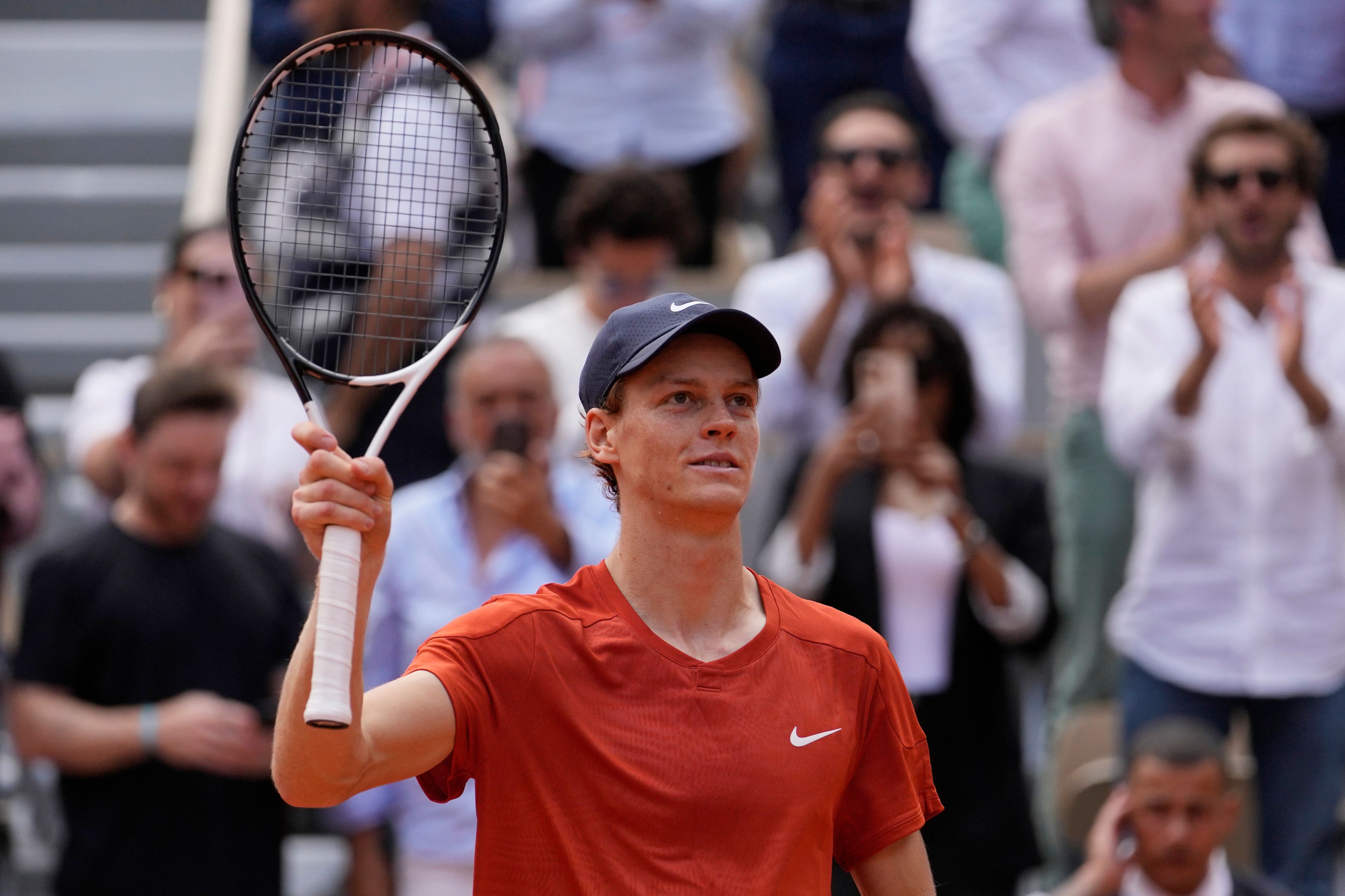 Italy's Jannik Sinner celebrates as he won the quarterfinal match of the French Open tennis tournament against Bulgaria's Grigor Dimitrov at the Roland Garros stadium in Paris, Tuesday, June 4, 2024.