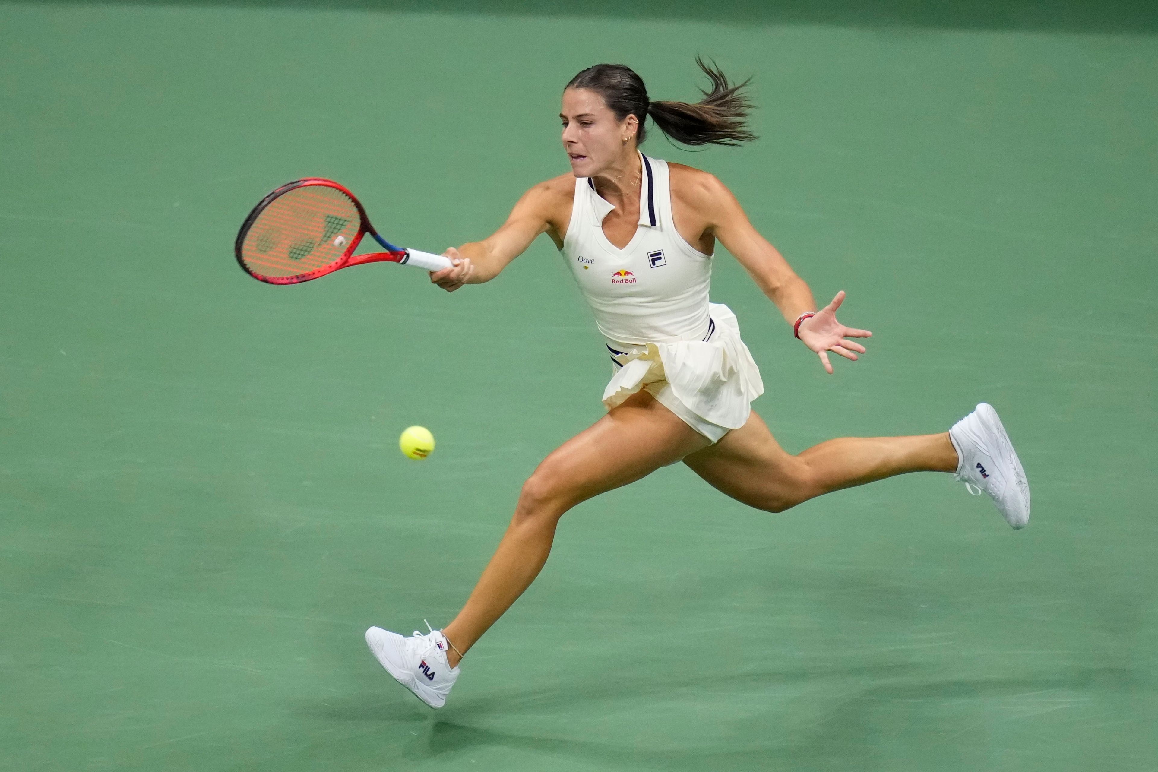 Emma Navarro, of the United States, returns a shot to Aryna Sabalenka, of Belarus, during the women's singles semifinals of the U.S. Open tennis championships, Thursday, Sept. 5, 2024, in New York.