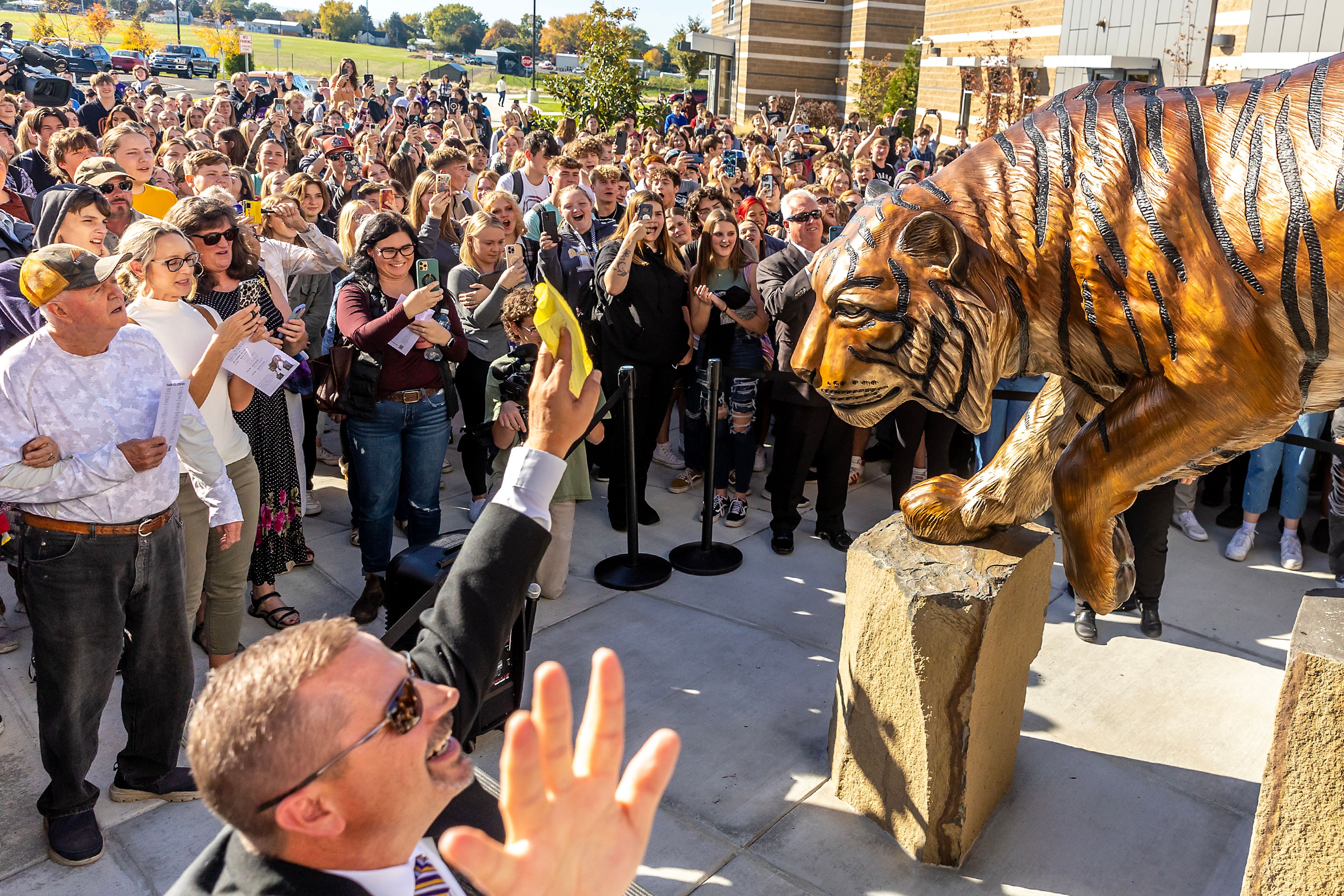 The bengal statue is unveiled to a crowd of students and supporters Thursday at Lewiston High School.