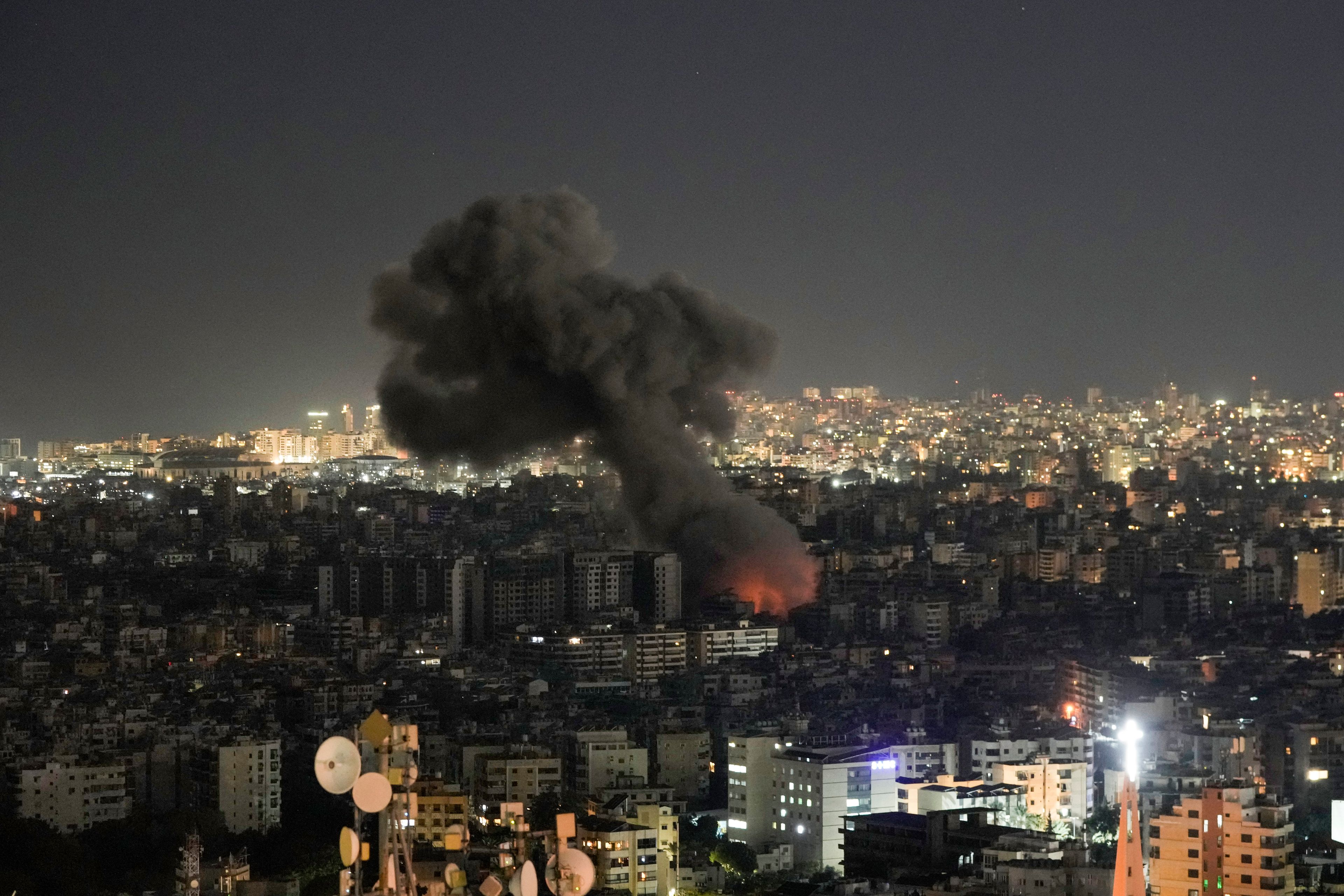 Flames and smoke rise from an Israeli airstrike on Dahiyeh, in the southern suburb of Beirut, Monday, Oct. 21, 2024. (AP Photo/Bilal Hussein)