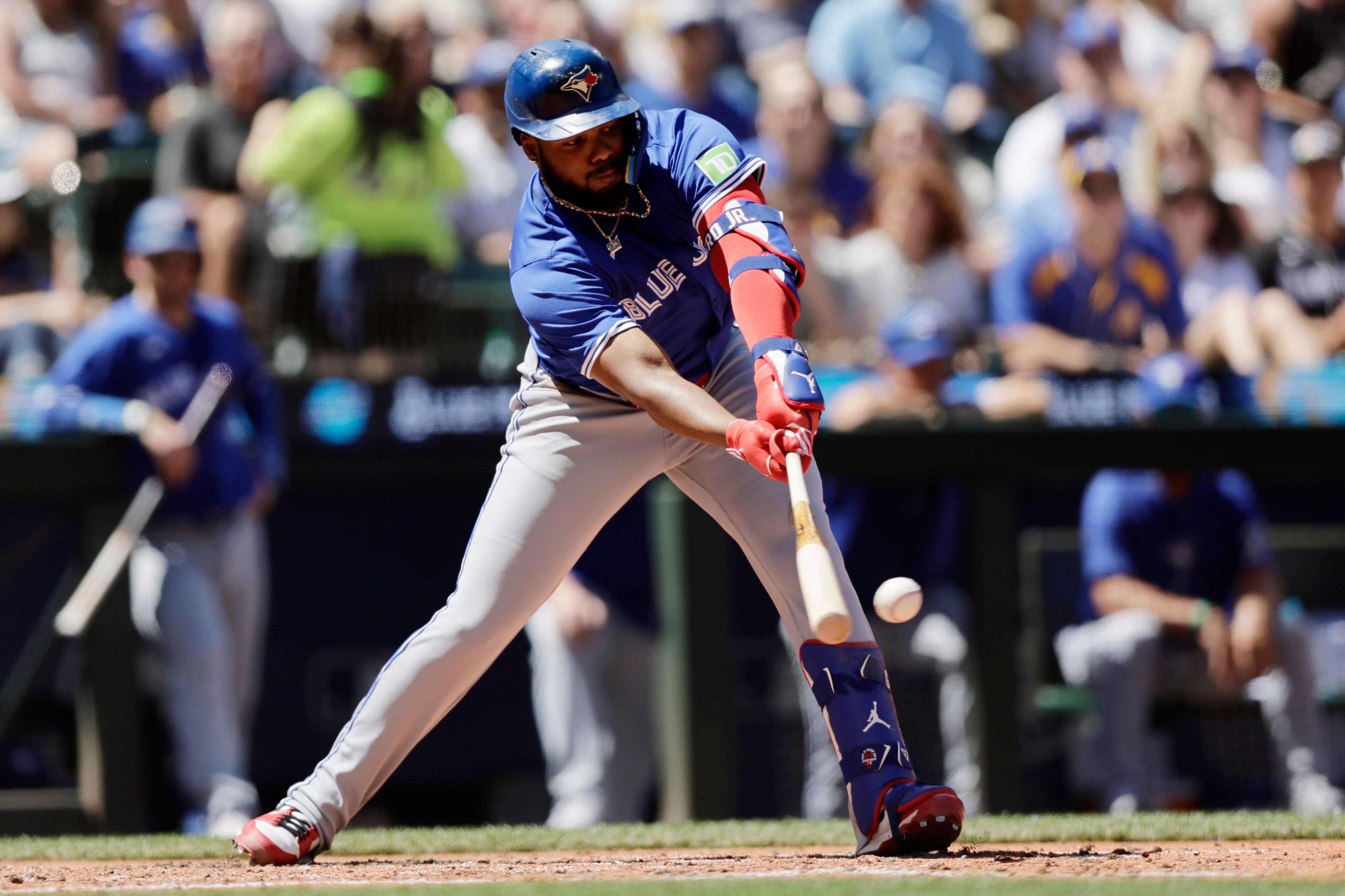 Toronto Blue Jays' Vladimir Guerrero Jr. hits an RBI single against the Seattle Mariners during the fifth inning in a baseball game, Saturday, July 6, 2024, in Seattle. (AP Photo/John Froschauer)